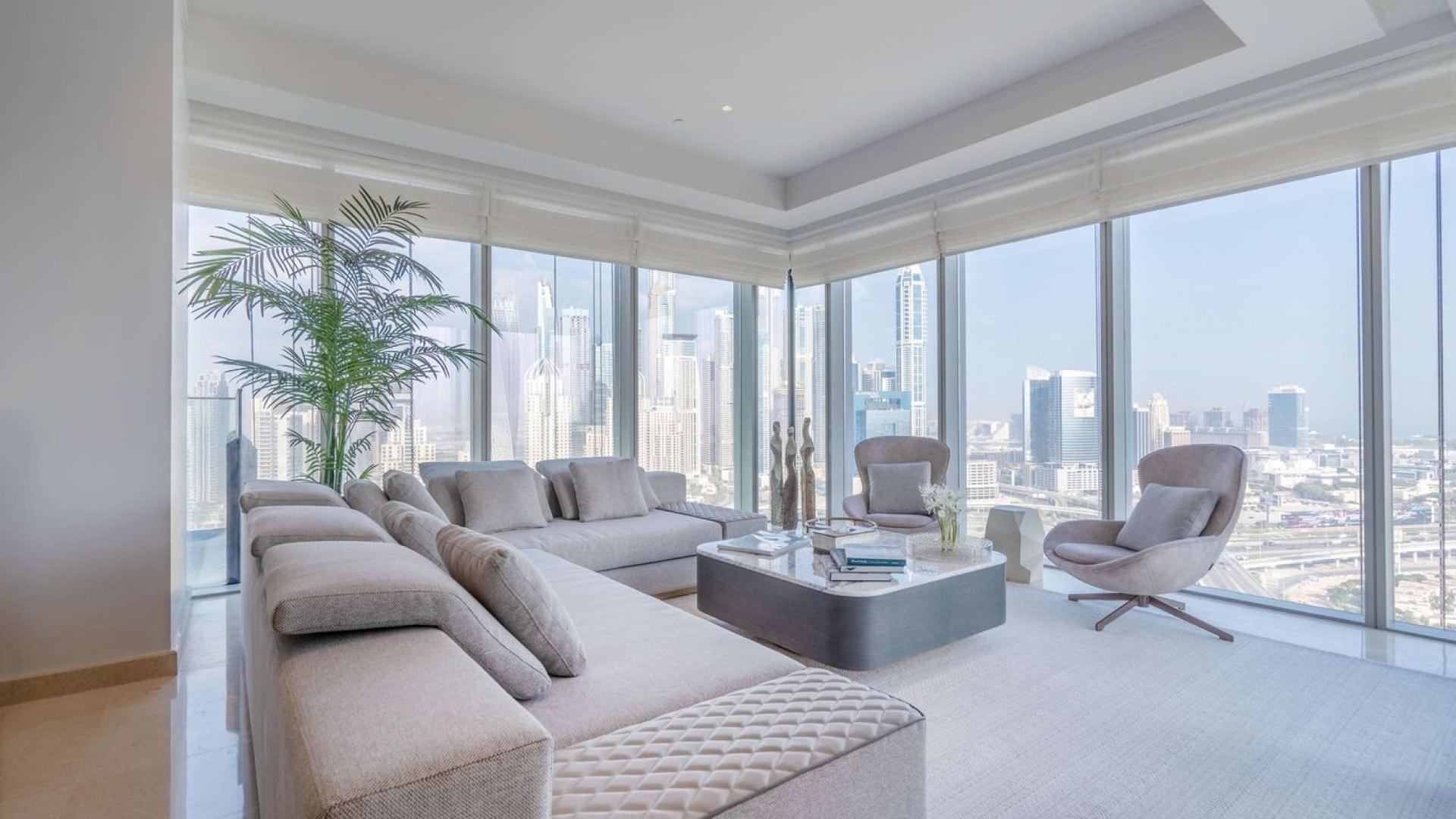 Modern living room in five-bedroom apartment at The Residences, Jumeirah Lake Towers, Dubai
