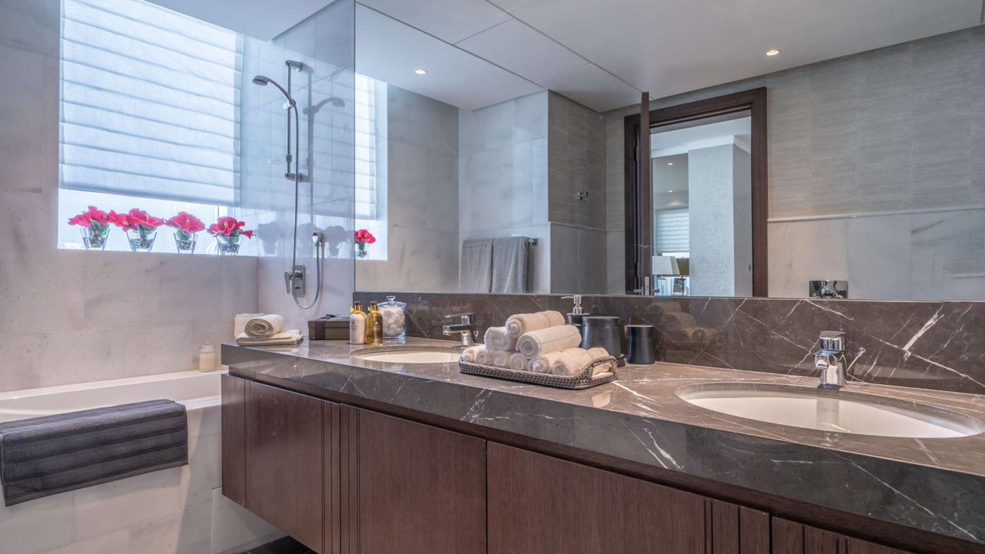 Luxurious dining area in full-floor penthouse, The Residences JLT, with city views