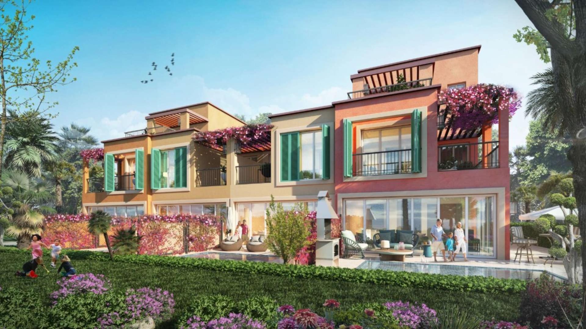 Luxurious 6-bedroom villa with garage, surrounded by lush greenery and vibrant flowers