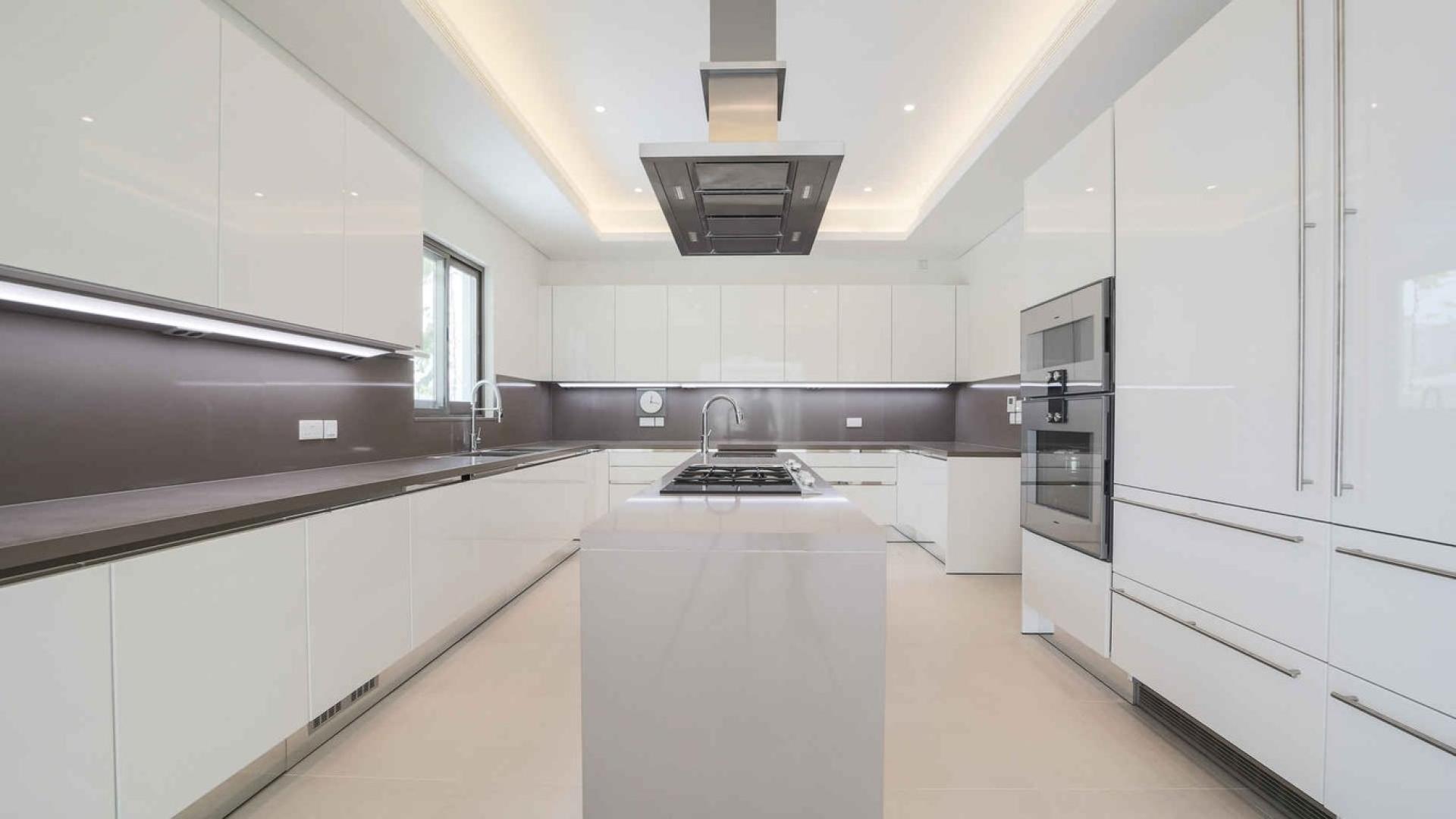 Spacious living area in upgraded 6-bedroom villa, Palm Jumeirah, with modern design and large windows