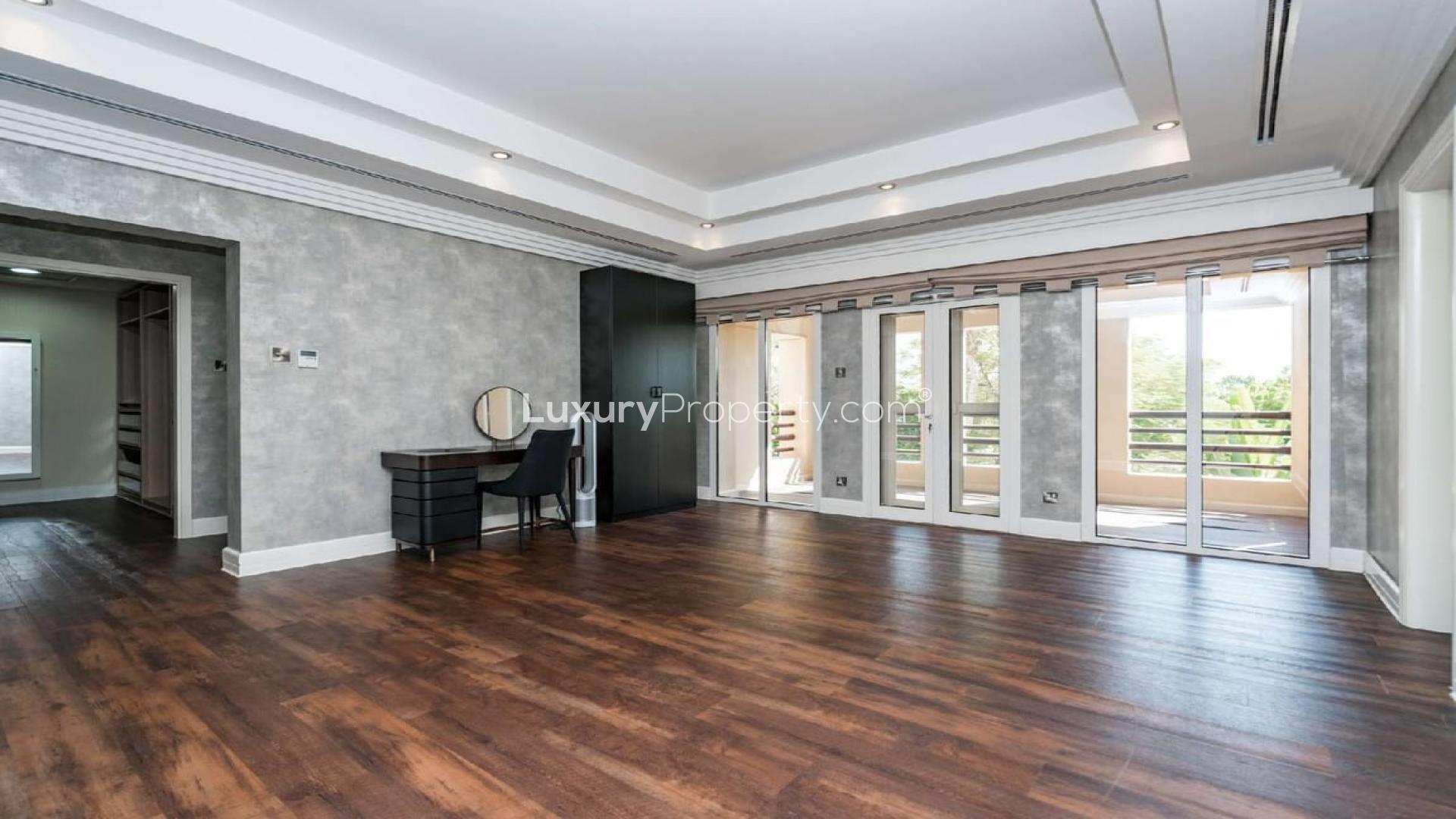 Luxurious living room in upgraded E1 villa, fireplace, modern decor, Arabian Ranches Hattan