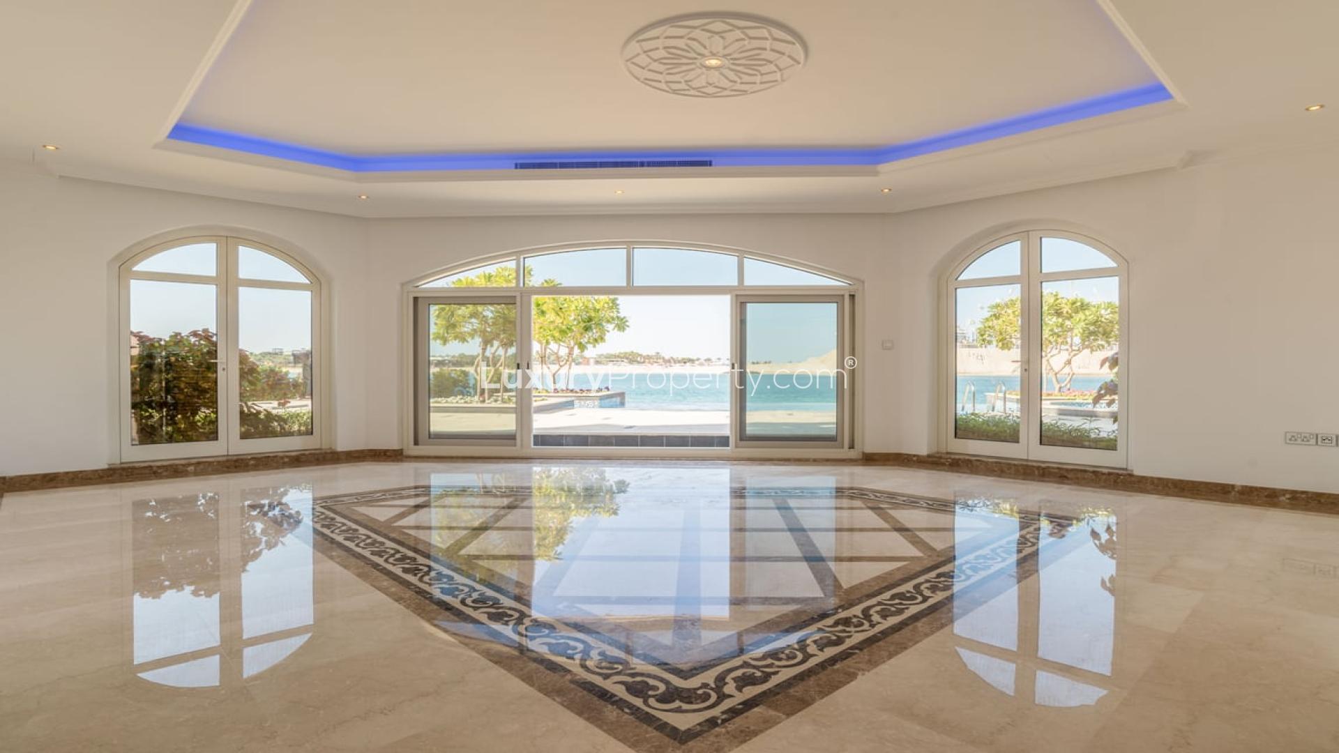 Luxurious villa interior with marble floors and ocean views, Palm Jumeirah rental property