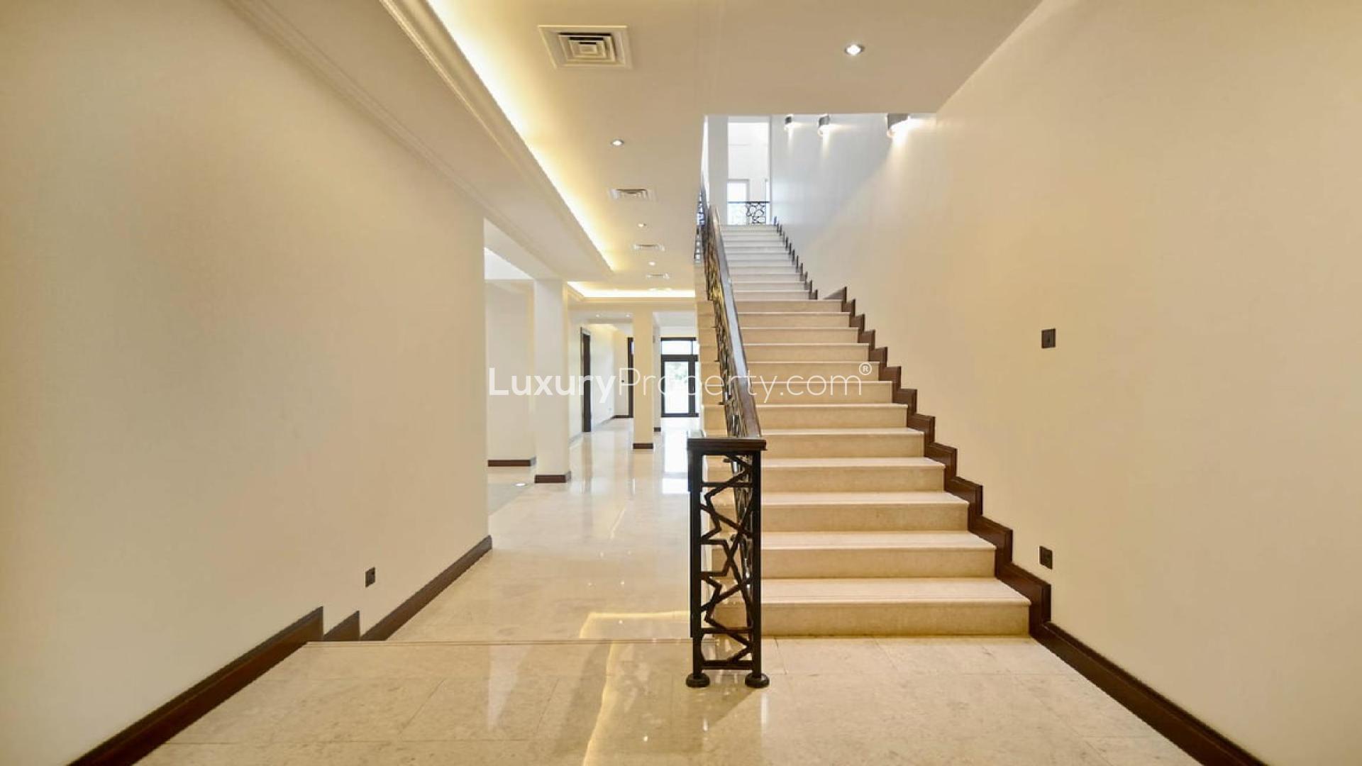 Luxurious staircase in a well-maintained 6-bedroom villa for rent, Al Barari, Ajman Uptown