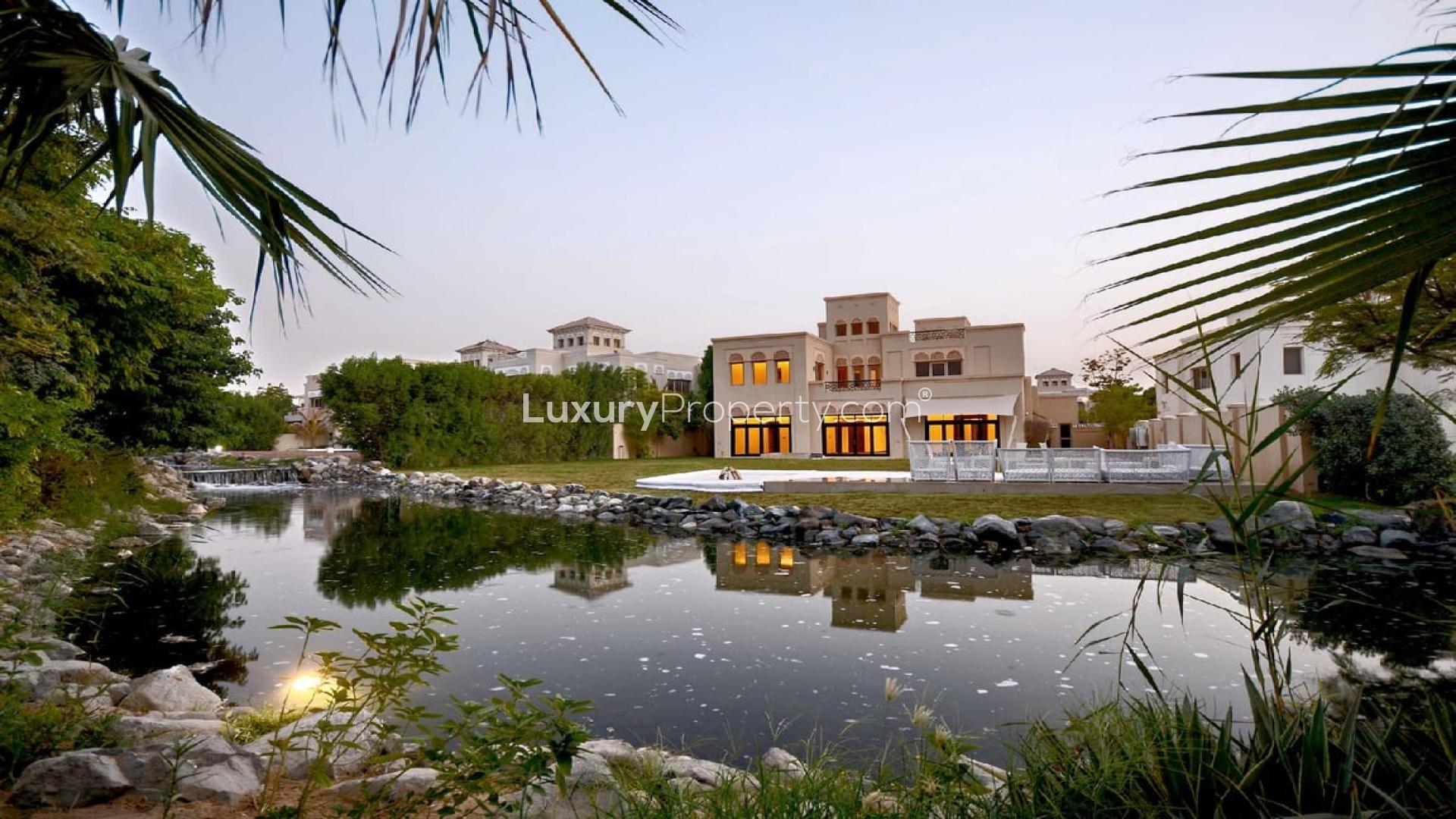 Luxurious 6-bedroom villa with serene pond view in Al Barari, Ajman Uptown