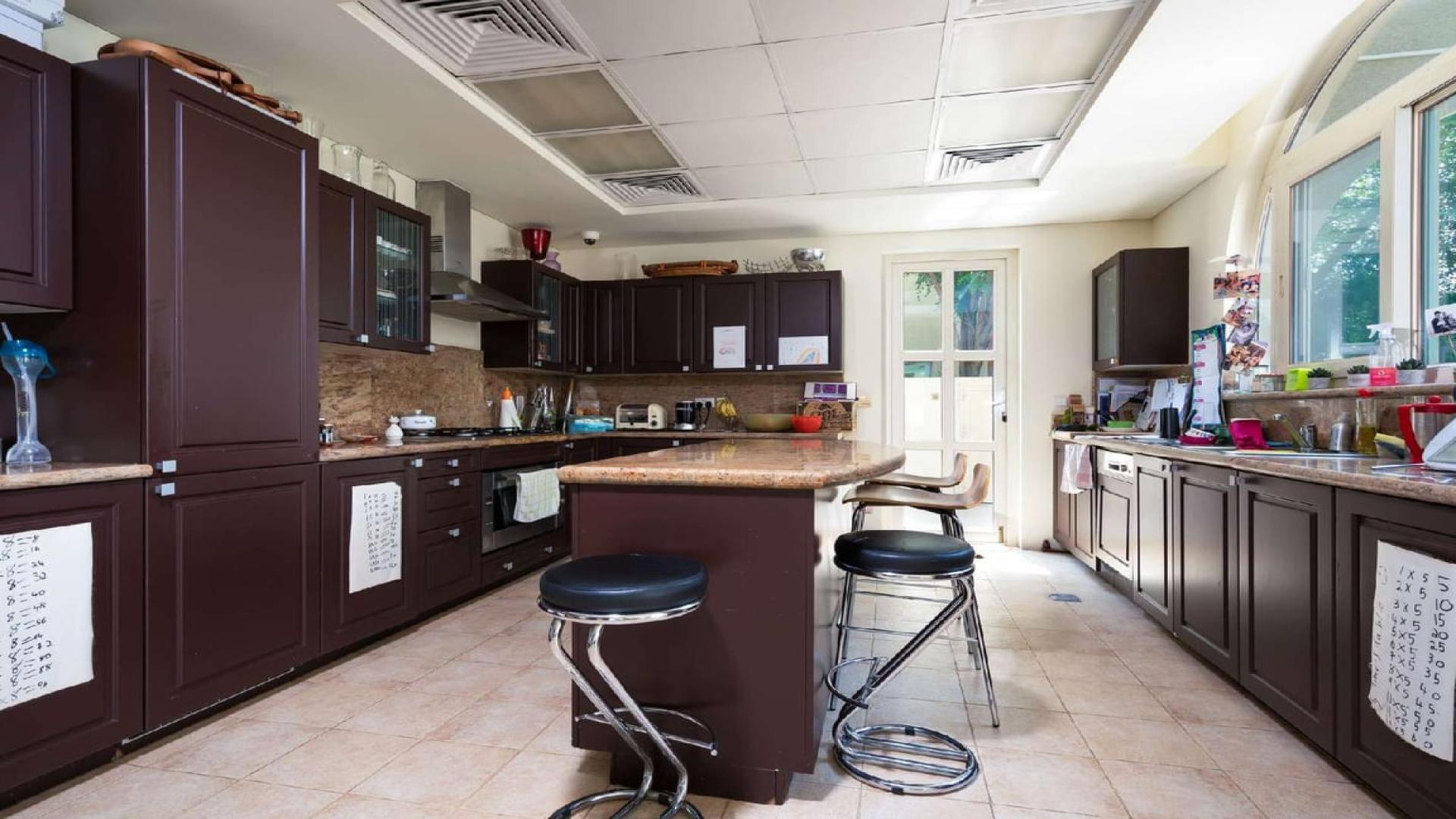 Living room with modern decor in 6-bedroom villa, Victory Heights, Dubai Sports City