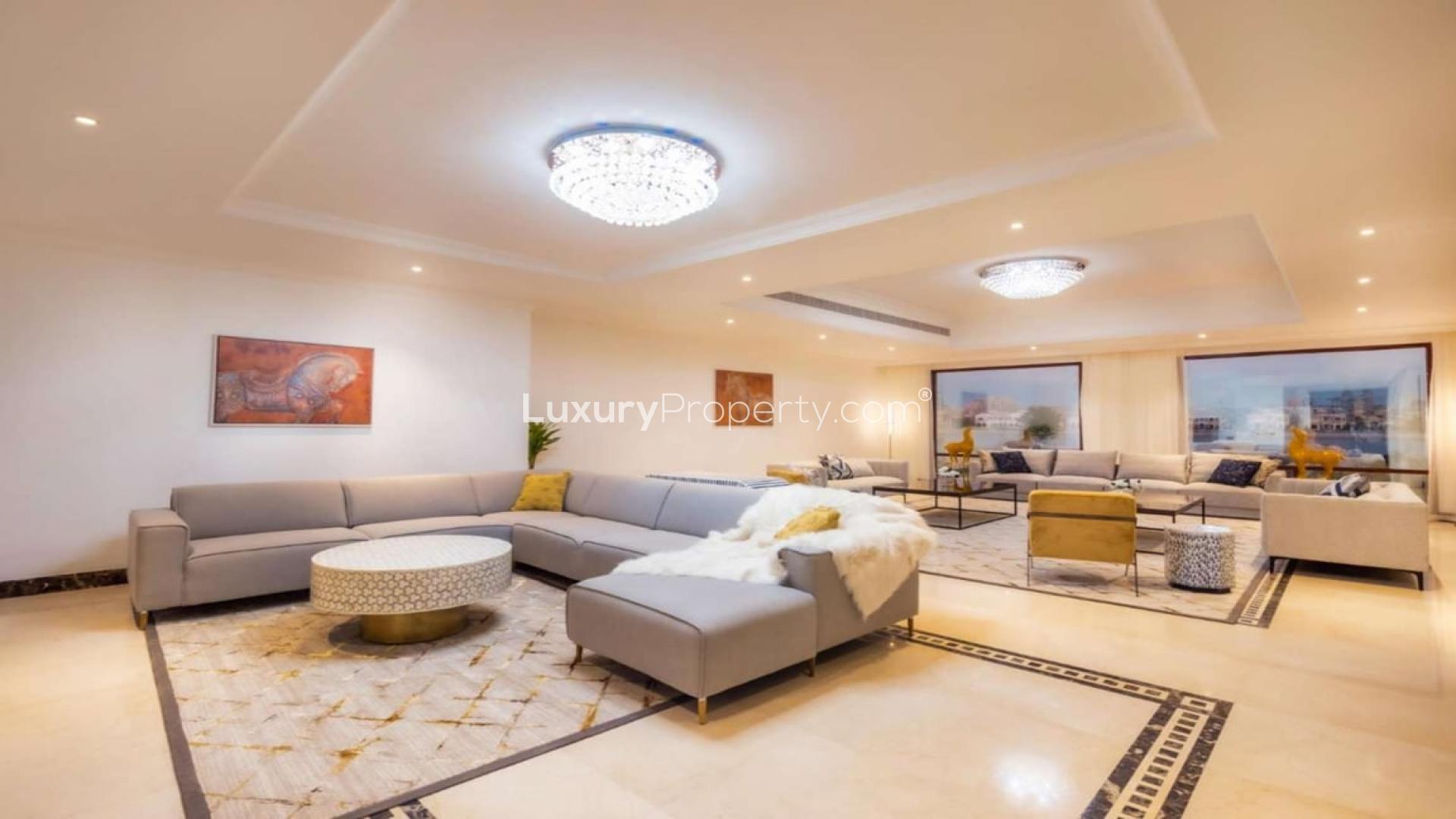 Spacious luxury villa bathroom with modern design on Palm Jumeirah, featuring elegant cabinetry