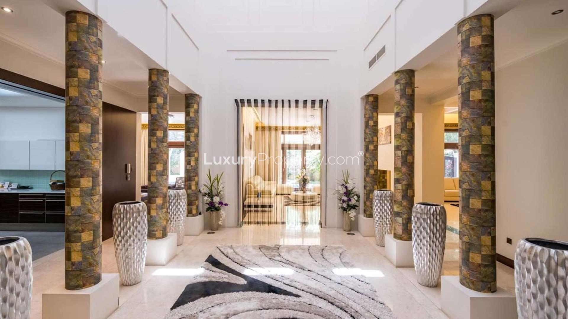 Beautiful Bromelia Villa exterior with pool, corner plot, Al Barari, luxury real estate