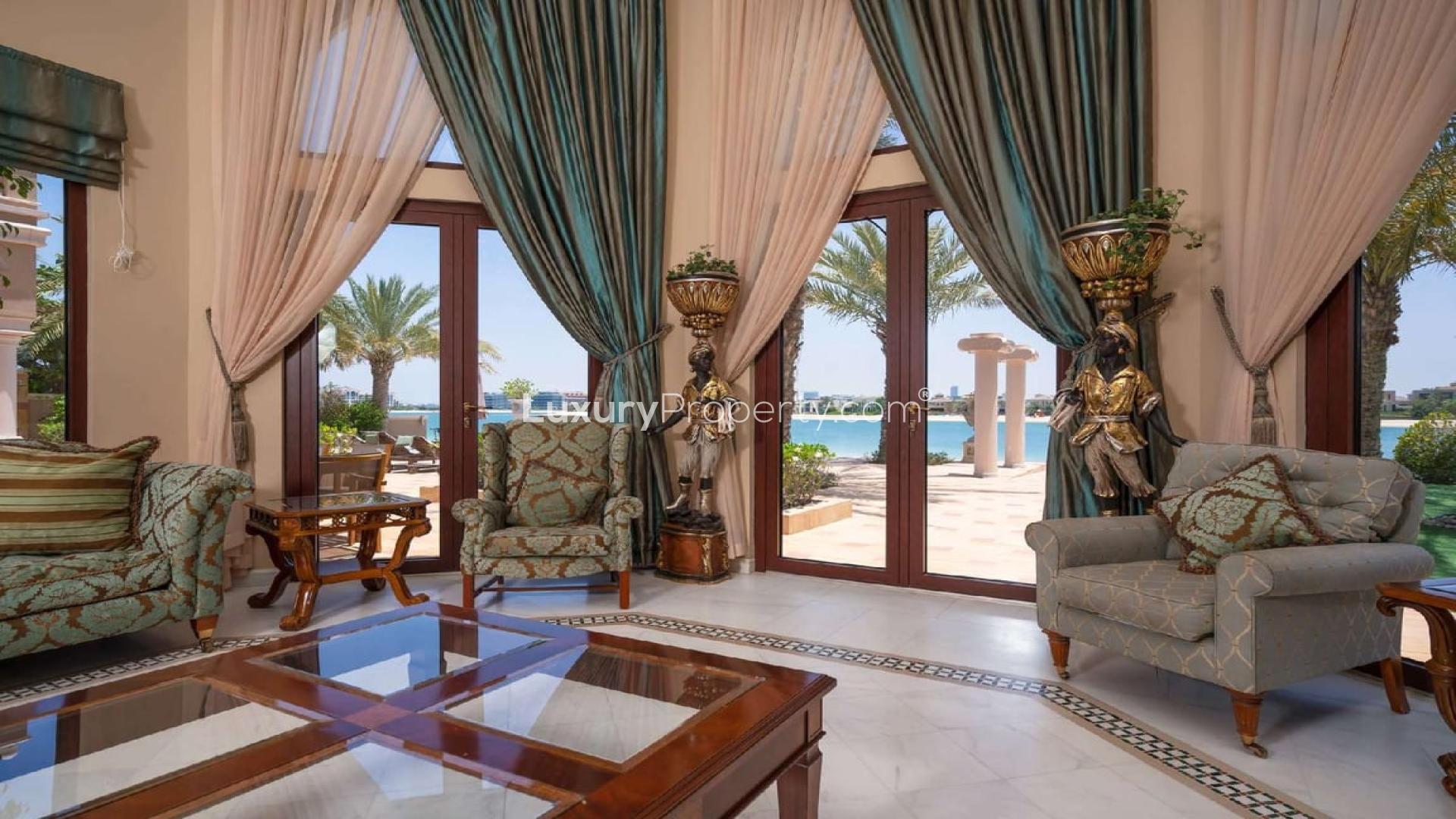 Luxurious living room in upgraded Palm Jumeirah villa with sea view and elegant decor