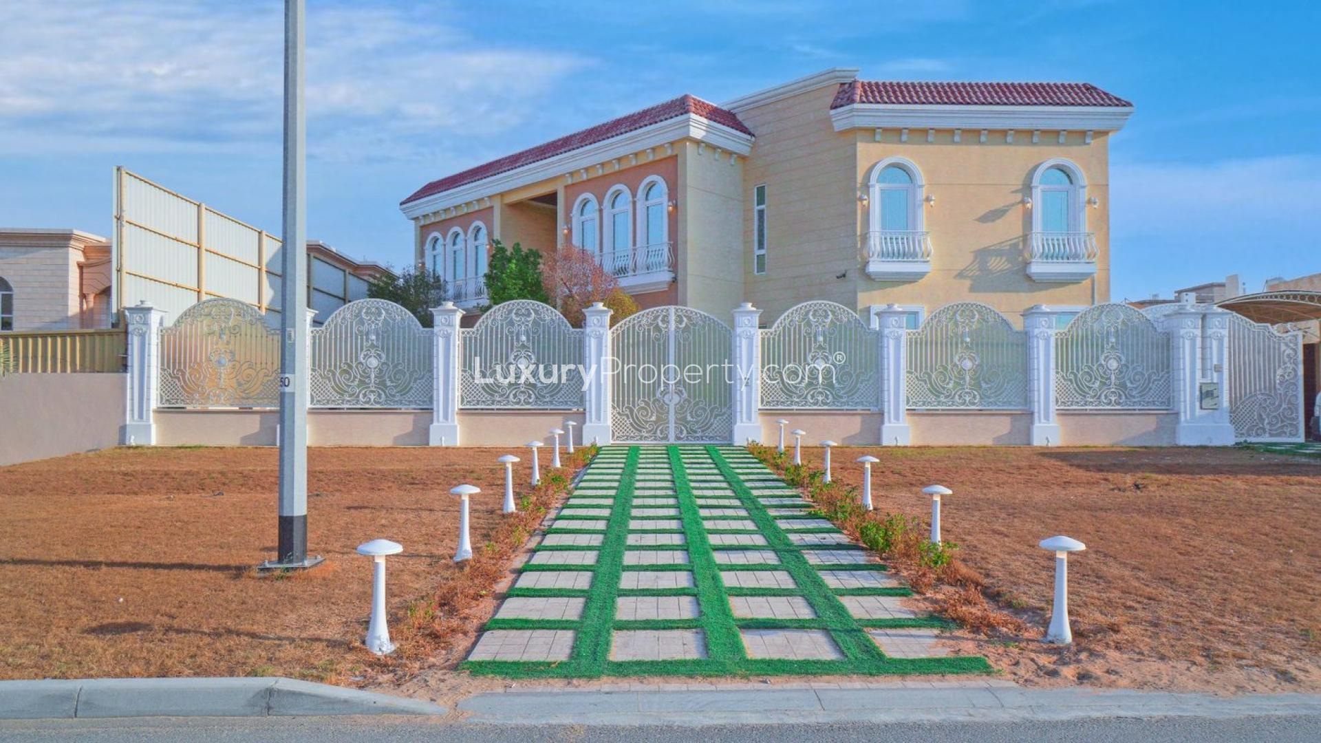 Luxury six-bedroom villa exterior with ornate gate in Nad Al Sheba 4, Dubai