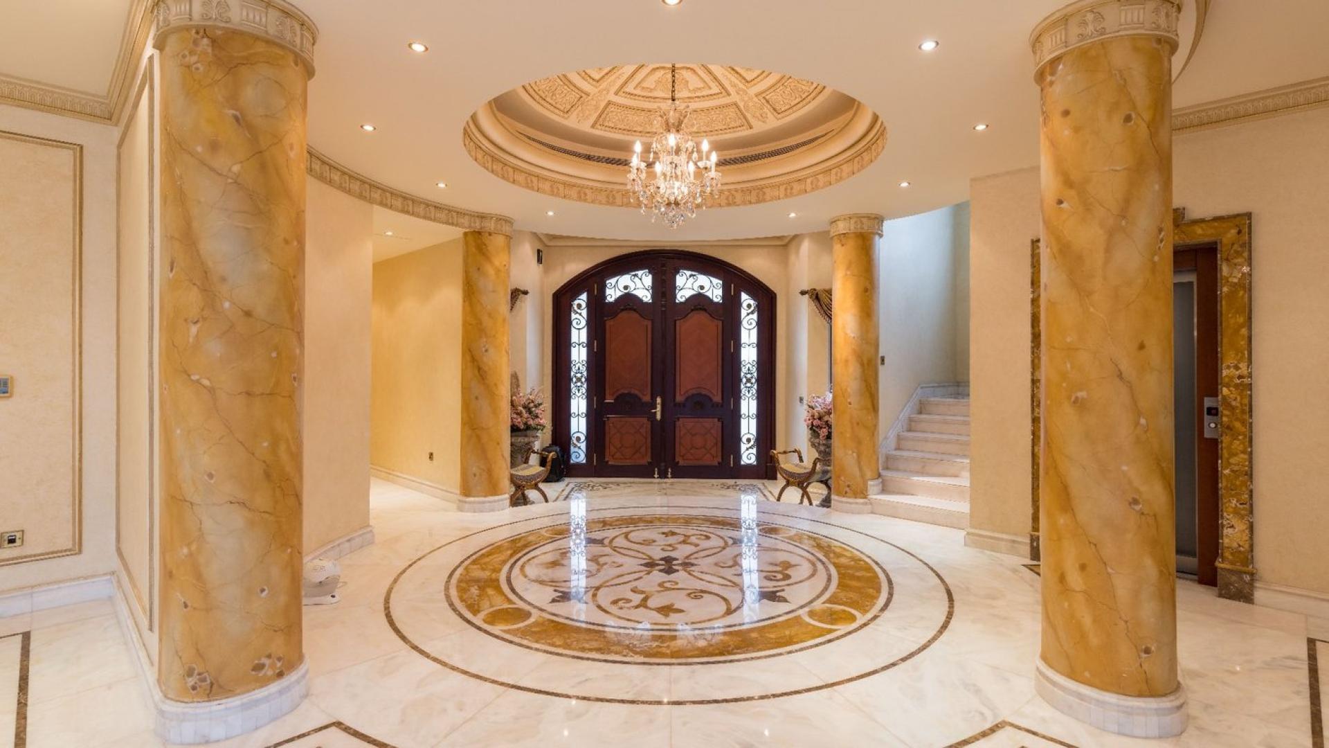 Luxurious villa interior with marble floors and chandeliers, Palm Jumeirah Signature Villa