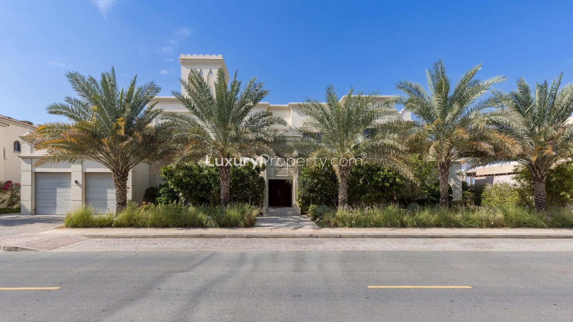Luxury Palm Jumeirah villa with private pool, spacious patio, and lush garden