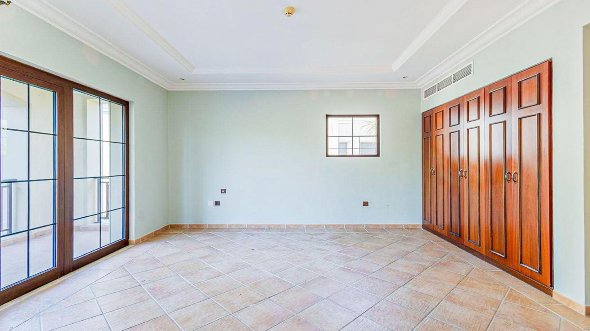 Empty room with wooden flooring in Jumeirah Golf Estates' Lime Tree Valley villa