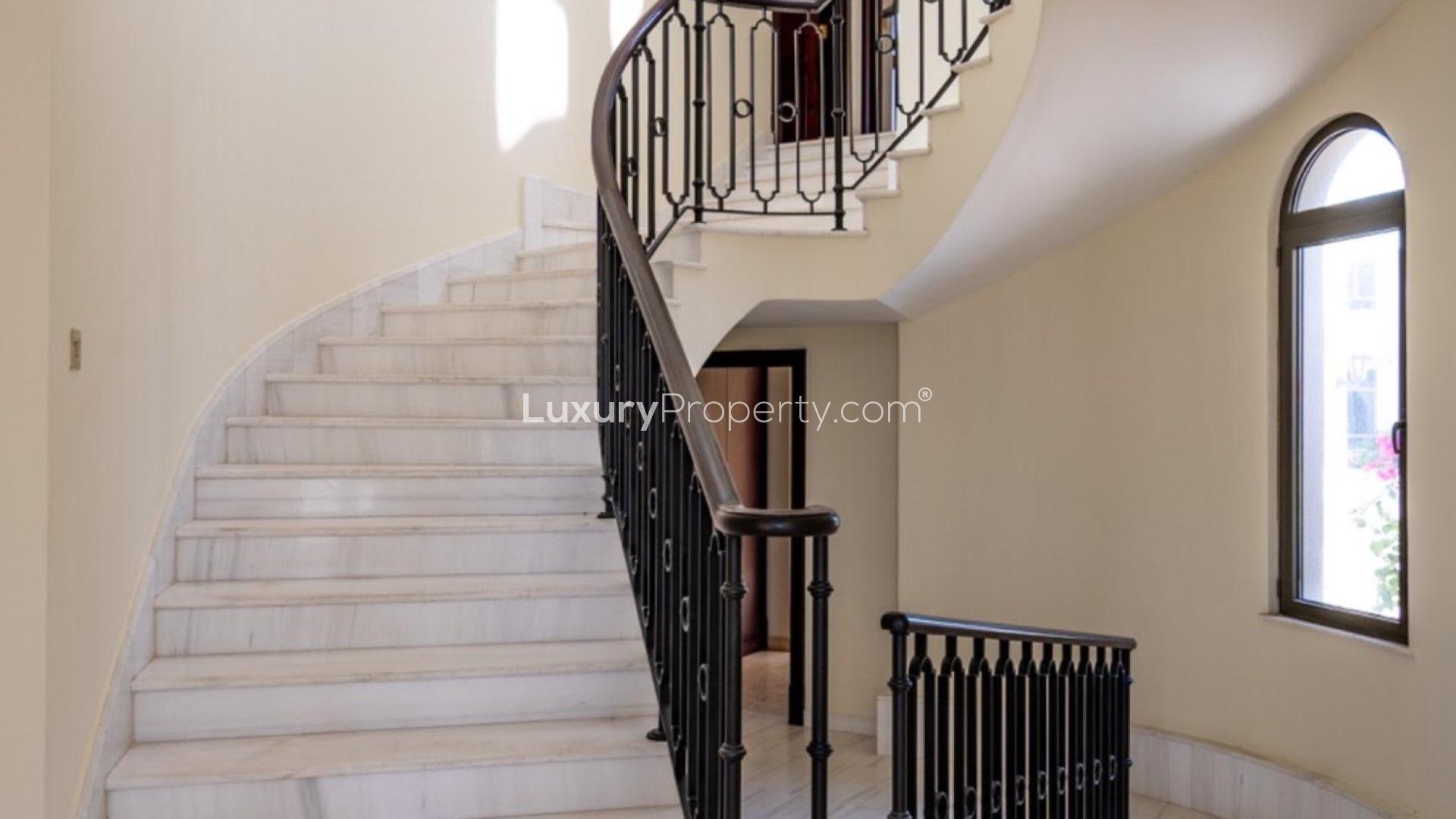 Interior of spacious villa with large windows, marble floors, Palm Jumeirah Signature Villas