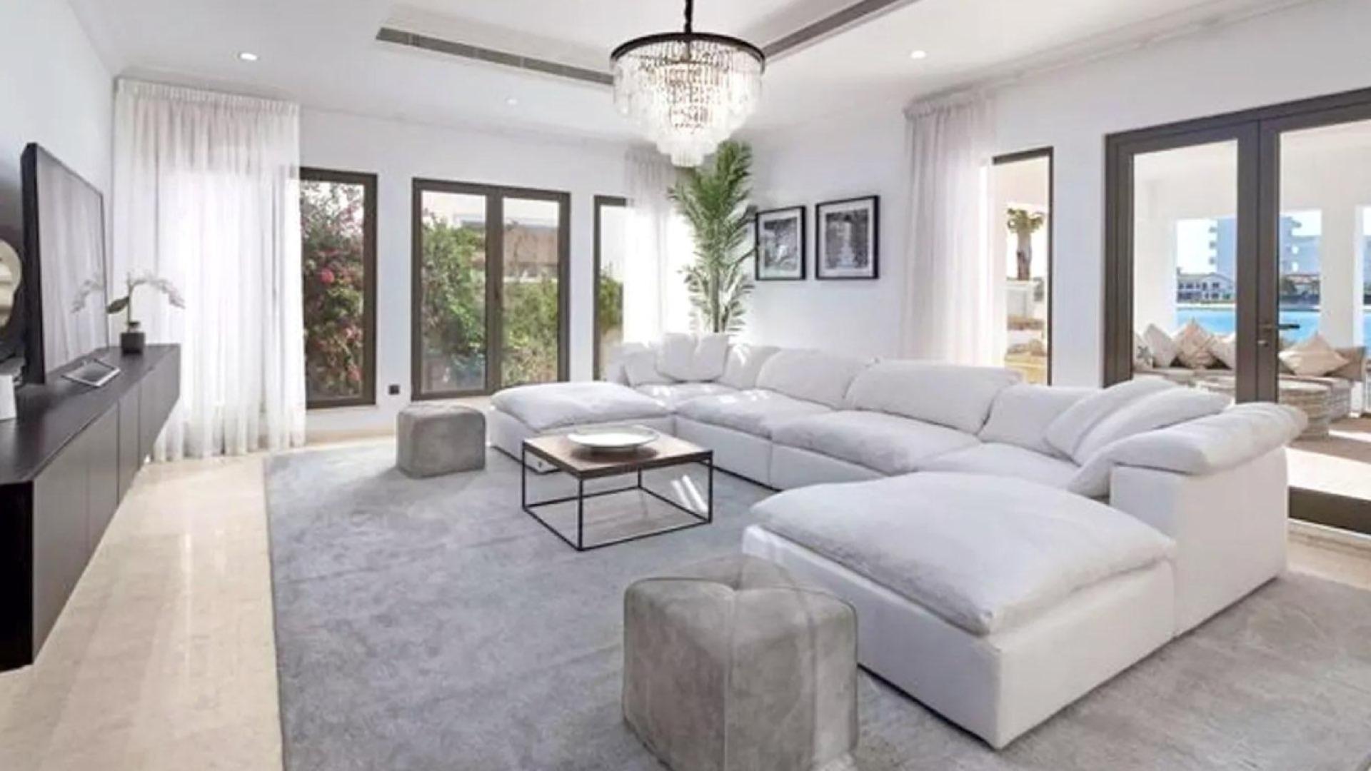 Luxurious villa terrace with plush seating and stunning sea view in Palm Jumeirah