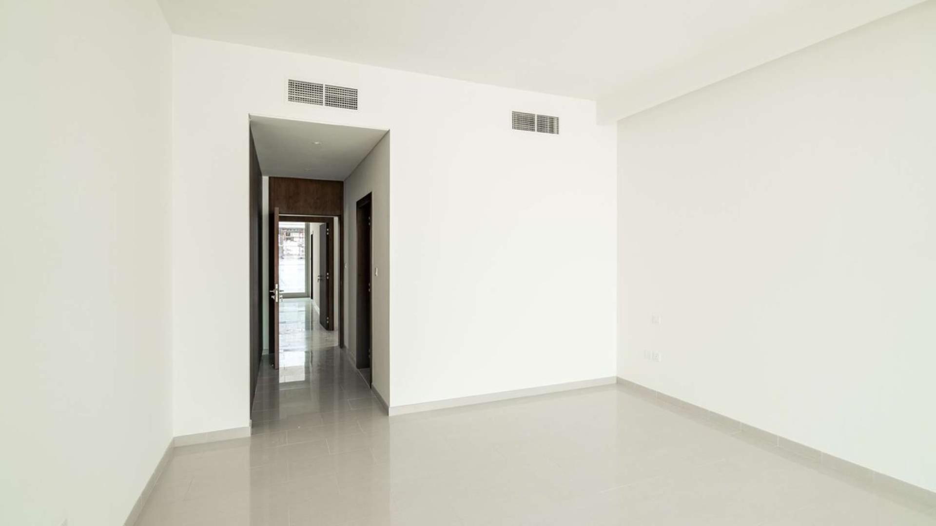 Modern kitchen with island in six-bedroom villa, Parkway Vistas, Dubai Hills Estate