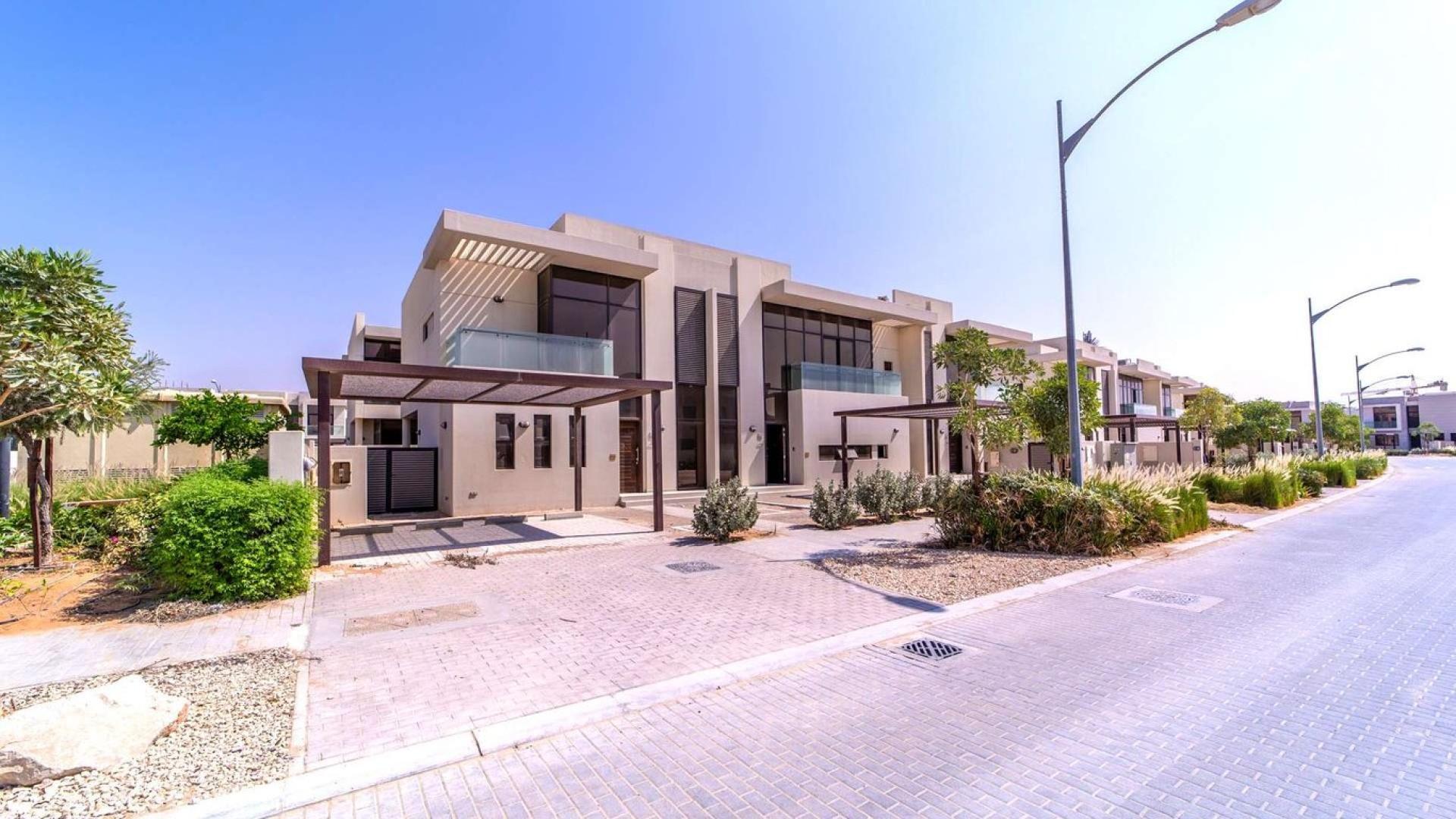 Luxurious villa exterior in The Field, Damac Hills, Dubailand, for sale