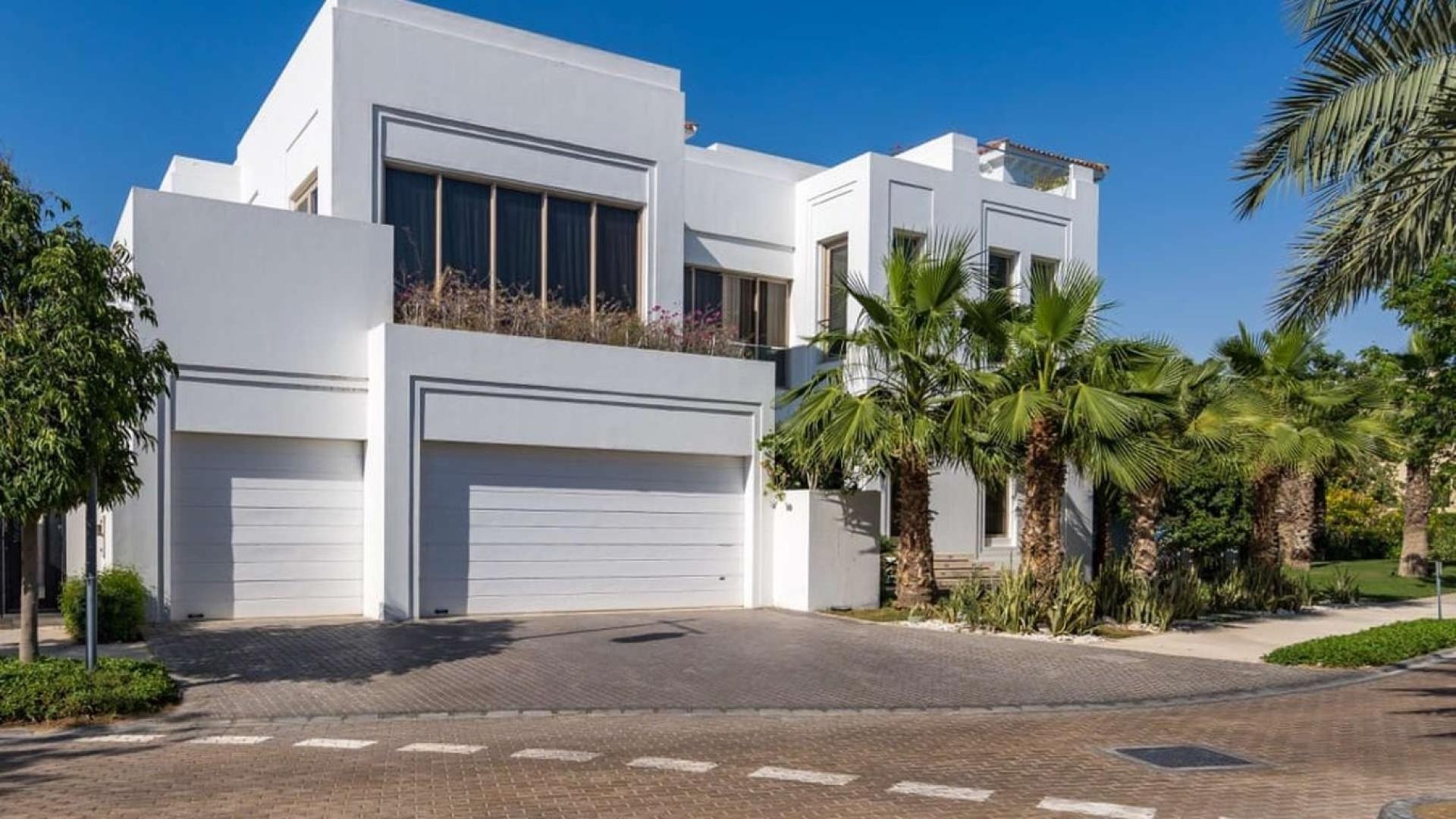 Enchanting 6-bed villa exterior in Al Barari, featuring modern design and lush landscaping