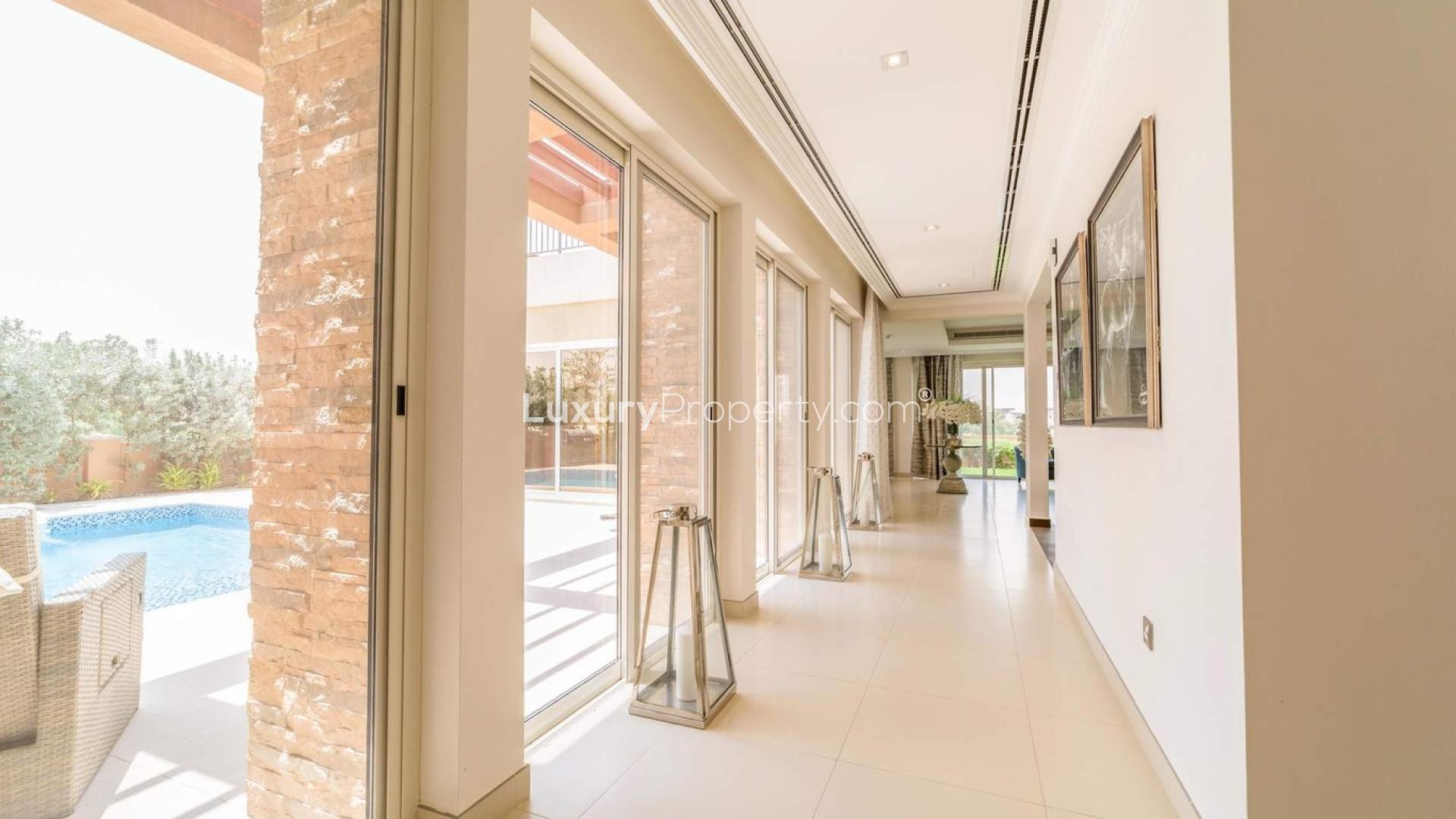 Gorgeous 6-bedroom villa exterior in Sienna Views, Jumeirah Golf Estates, lush garden view