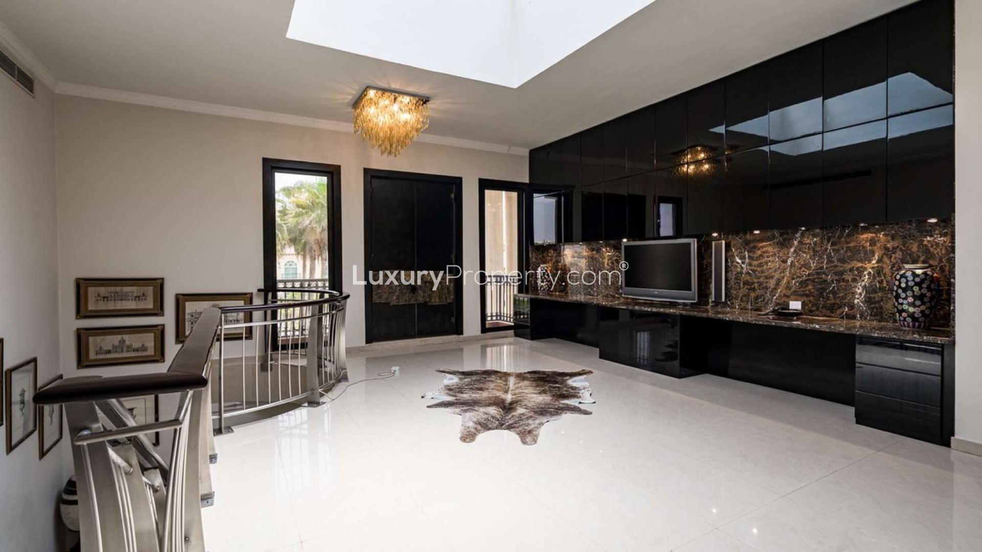 Luxurious living room in Al Manara villa, featuring elegant decor and modern furnishings