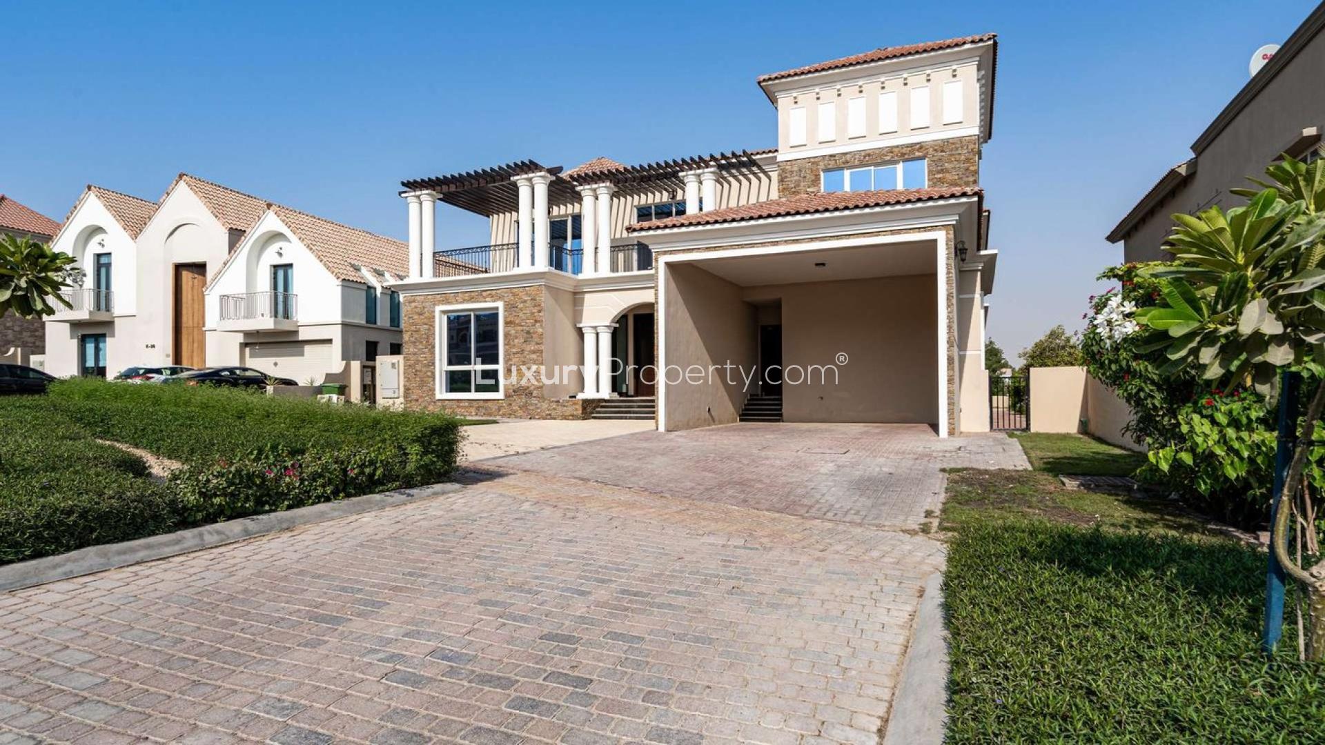 Exceptional six-bedroom villa exterior with driveway in Jumeirah Golf Estates, Earth Course