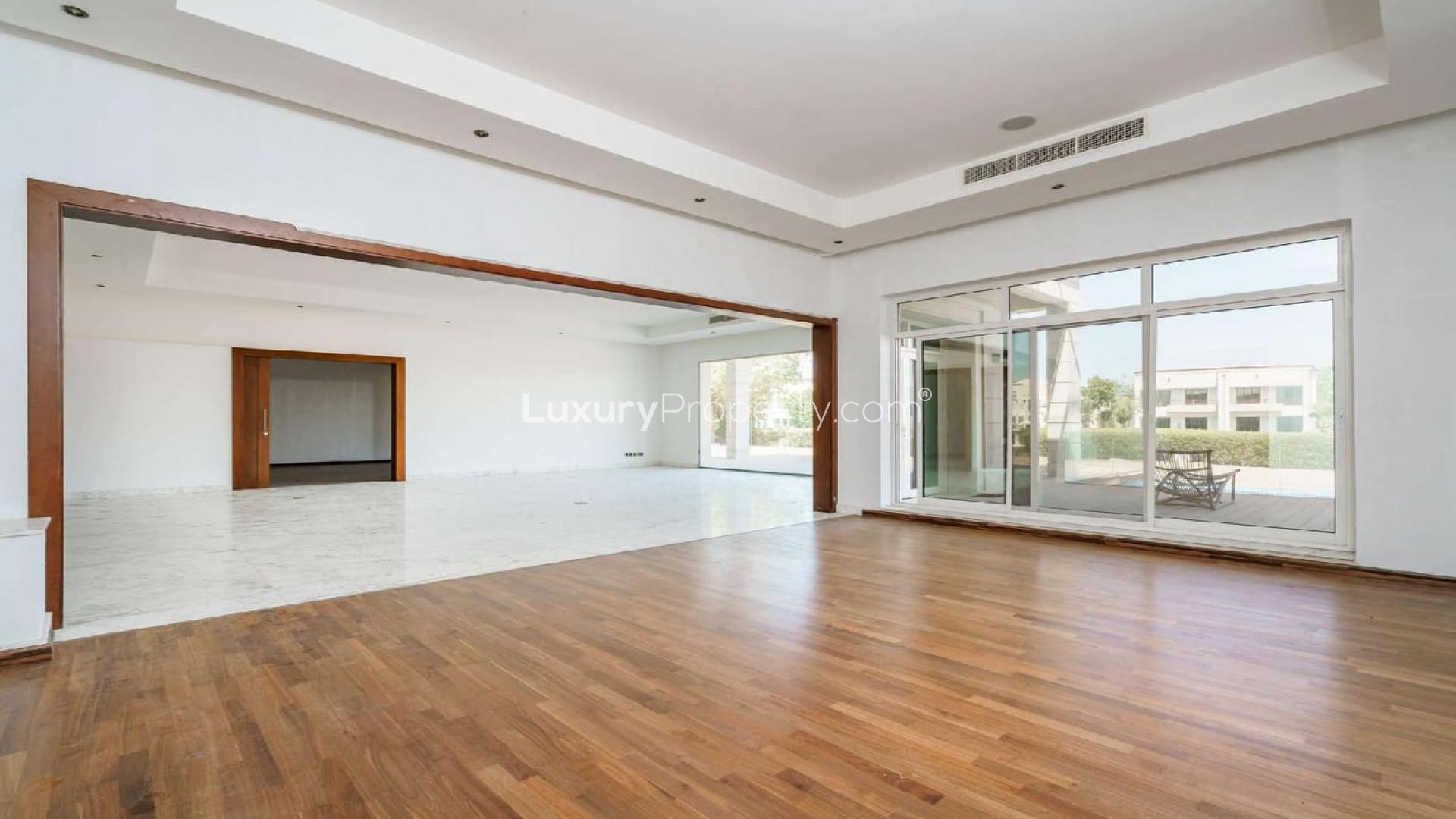 Stunning 6-bedroom villa exterior in Emirates Hills, Sector P, with spacious driveway