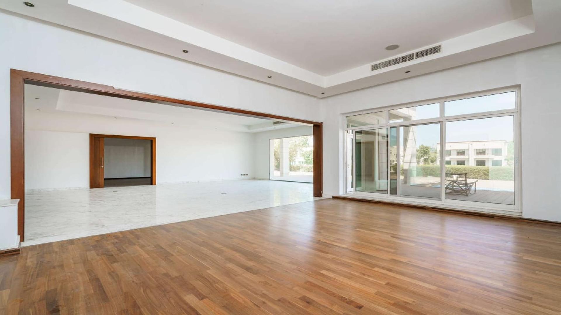 Stunning 6-bedroom villa exterior in Emirates Hills, Sector P, with spacious driveway