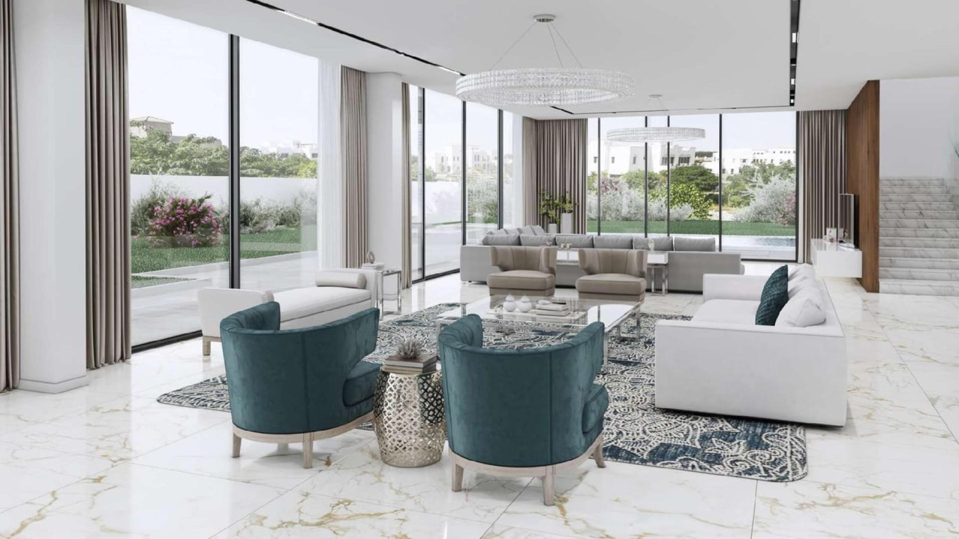 Luxurious living room in Al Barari villa, featuring modern furniture and large windows