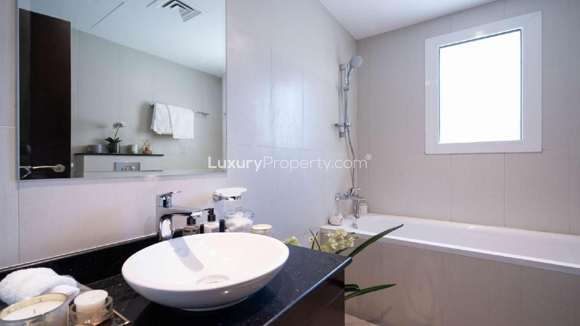 Exterior view of luxury villa for sale in Jumeirah Golf Estates, Earth community