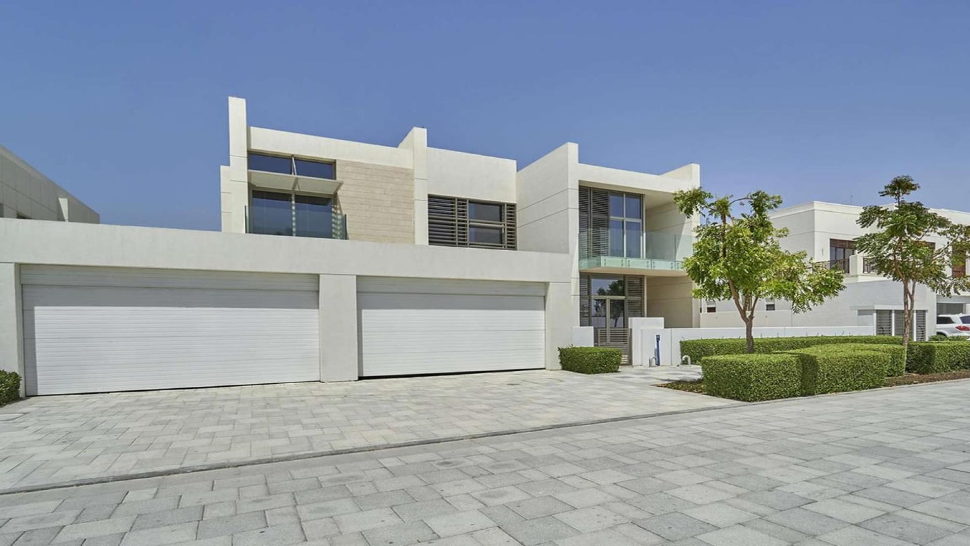 Contemporary villa exterior in District One, Mohammed Bin Rashid City, featuring modern architecture