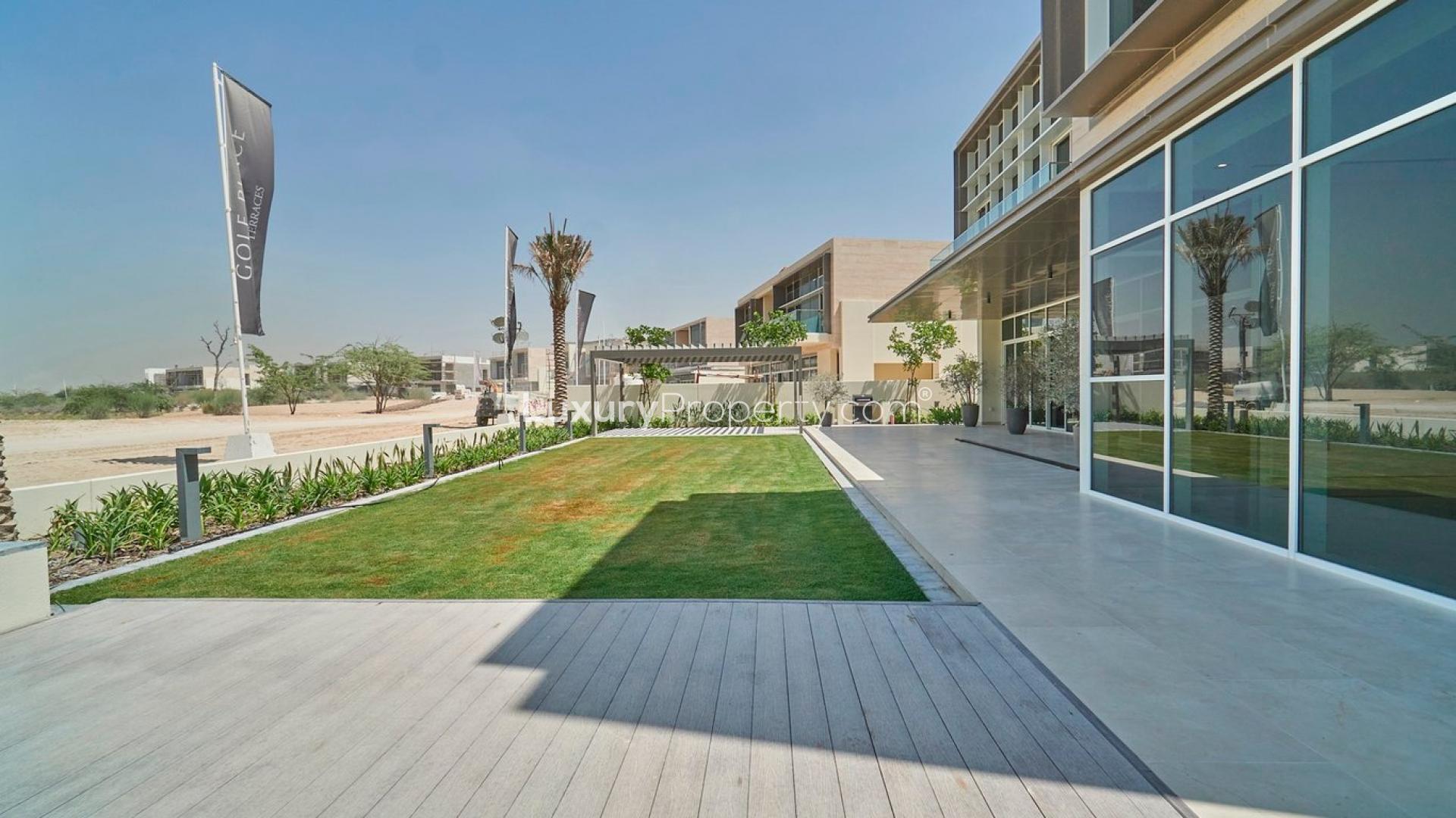 Modern kitchen in 6-bedroom villa, Golf Place, Dubai Hills Estate, with sleek marble countertops