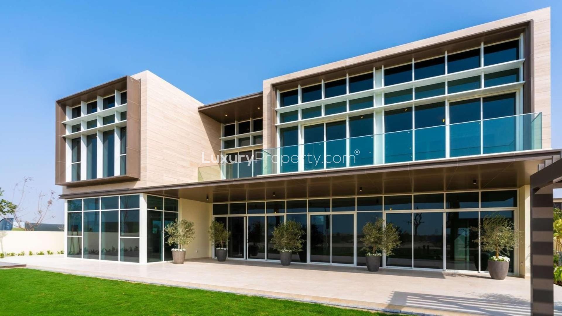 Interior of 6-bedroom villa in Dubai Hills Estate, featuring modern staircase and open layout