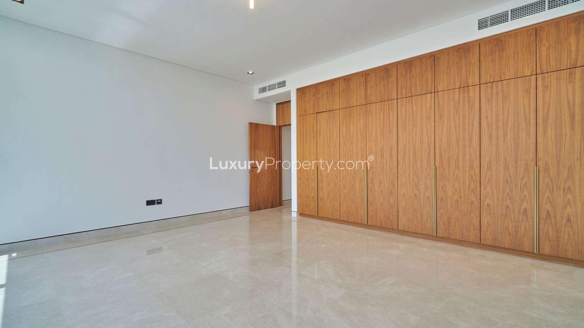 Elegant villa exterior with modern architecture, spacious lawn in Golf Place, Dubai Hills Estate