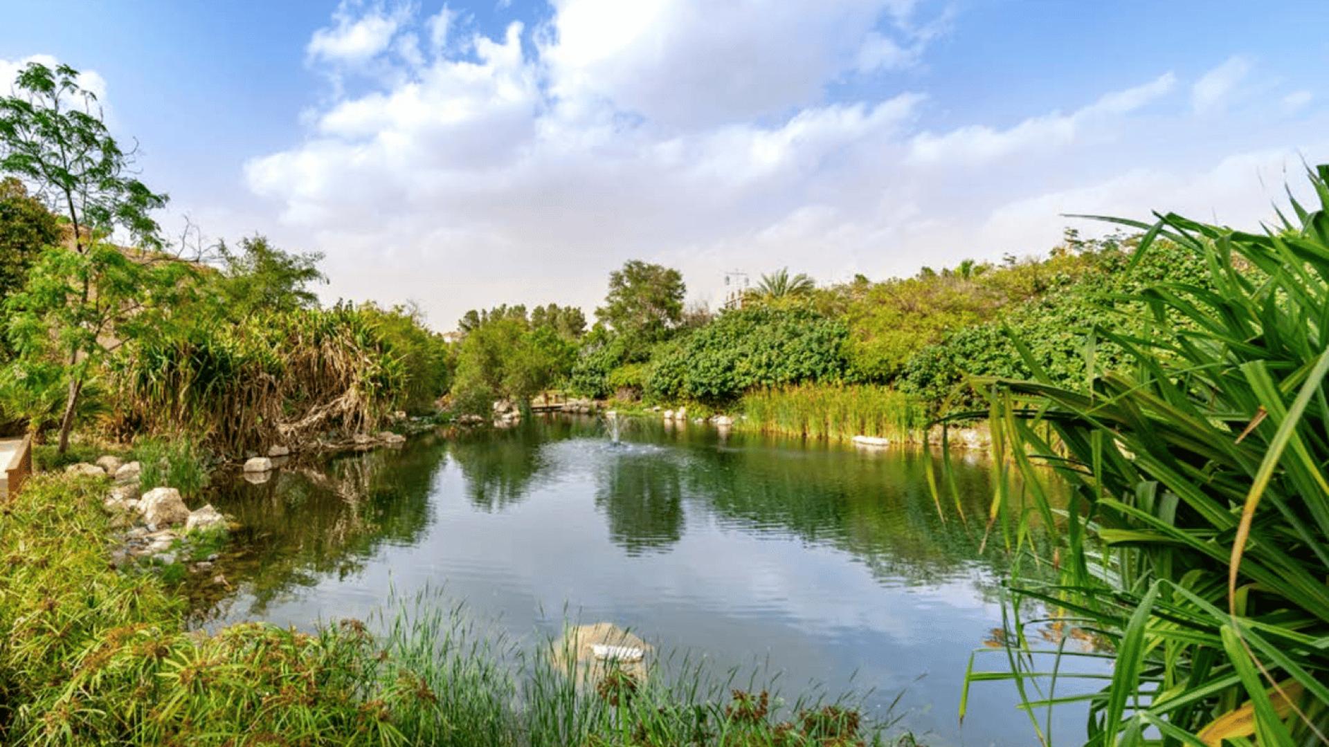 Modern Lunaria Villa exterior with lush garden in Al Barari, for sale