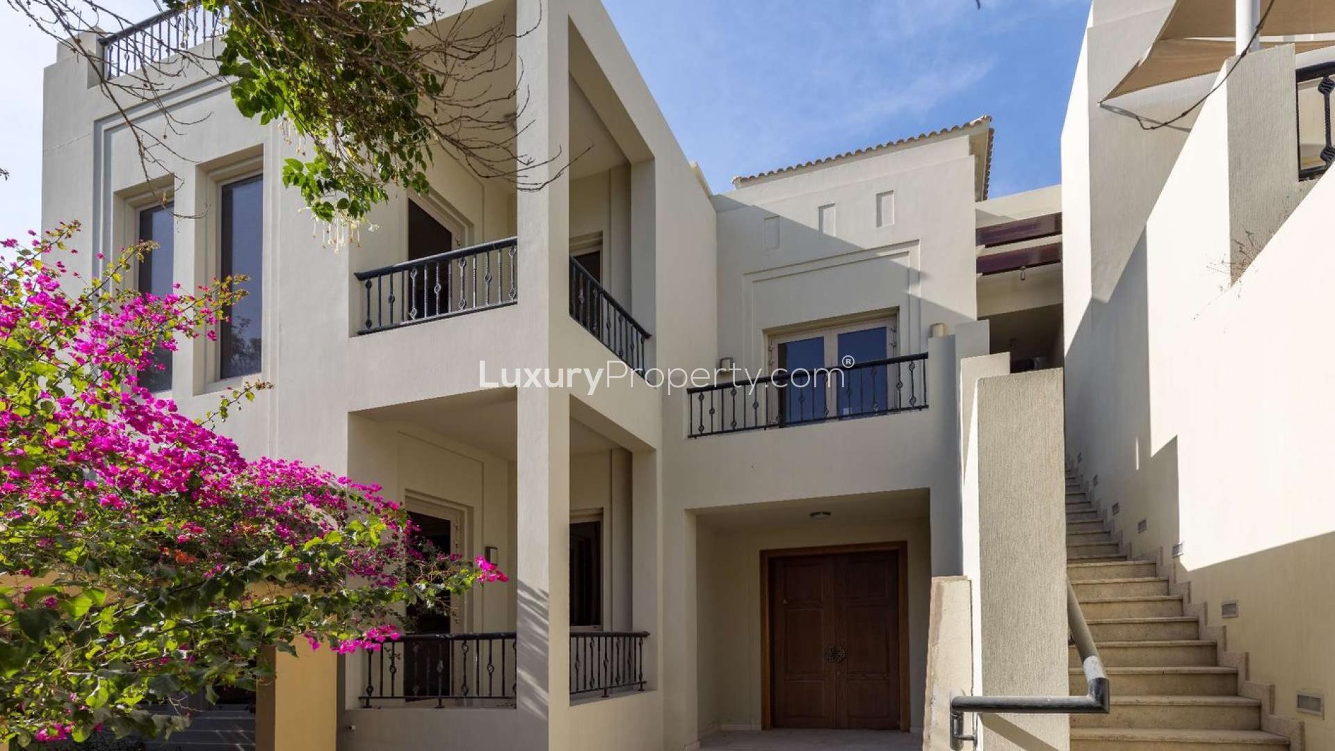 Exterior view of B-Type Villa for sale in Al Barari, featuring lush greenery