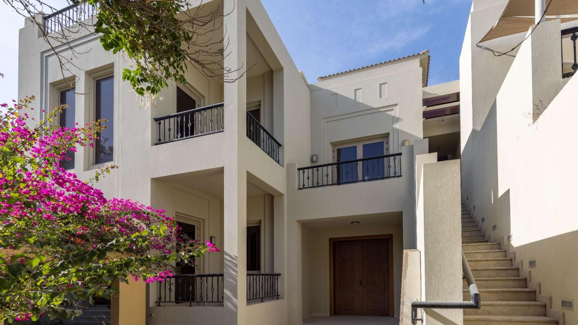 Exterior view of B-Type Villa for sale in Al Barari, featuring lush greenery