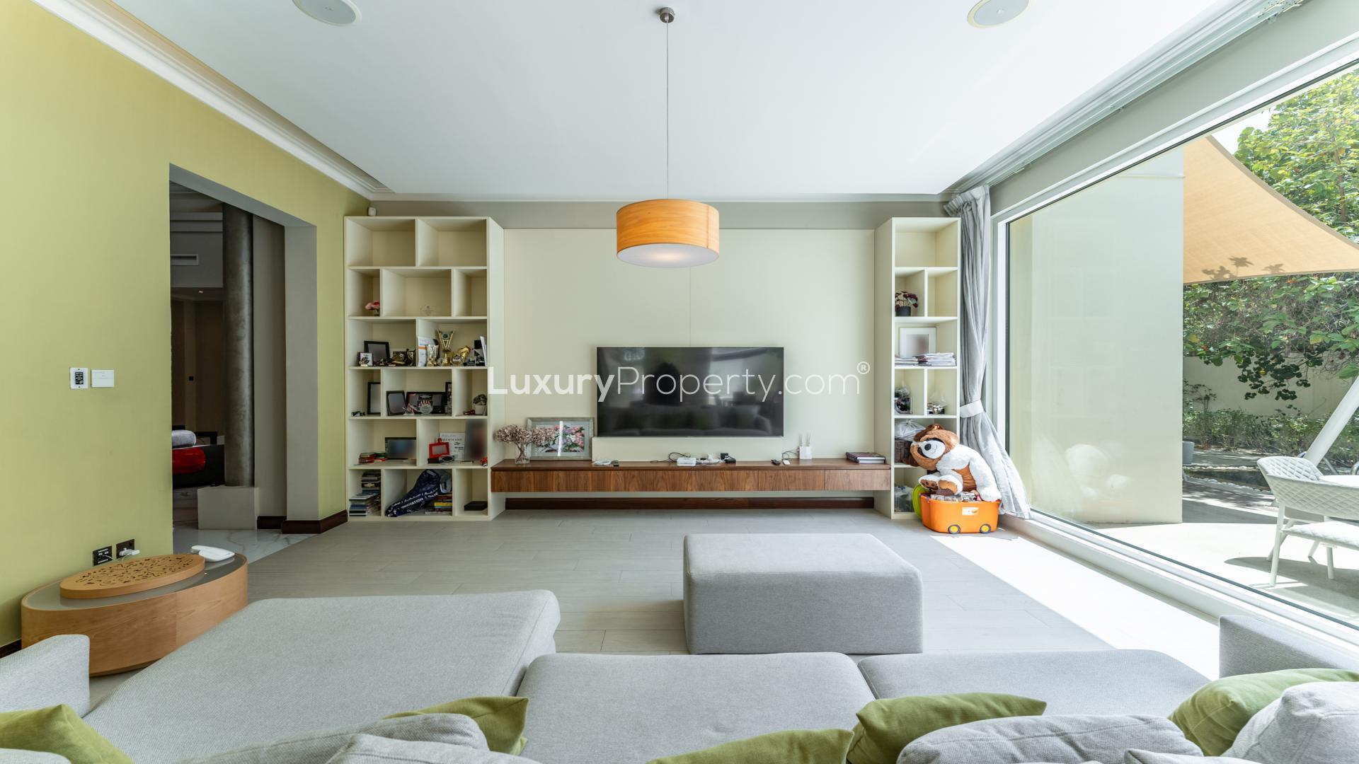 Luxurious Al Barari villa with private pool, spacious patio, and lush greenery for sale