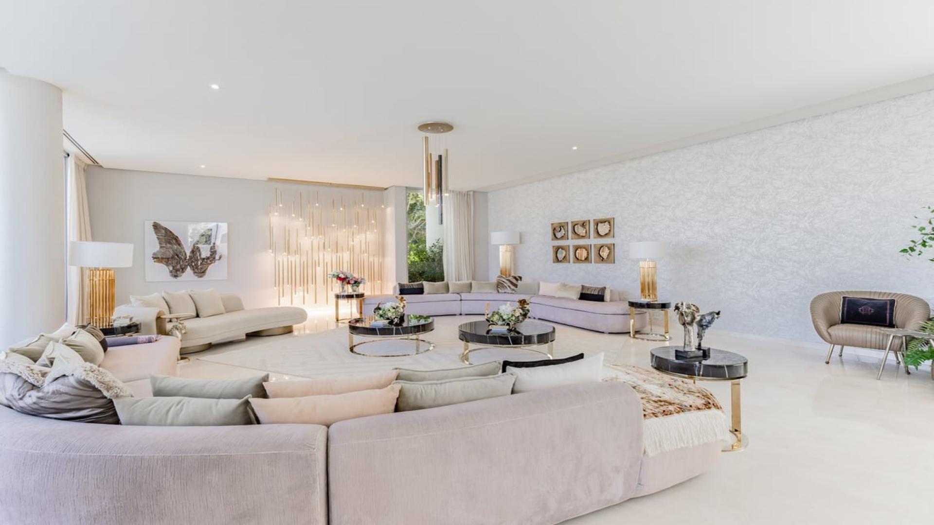 Luxurious living room in 6-bed villa, Fairways Vistas, Dubai Hills Estate, with elegant decor