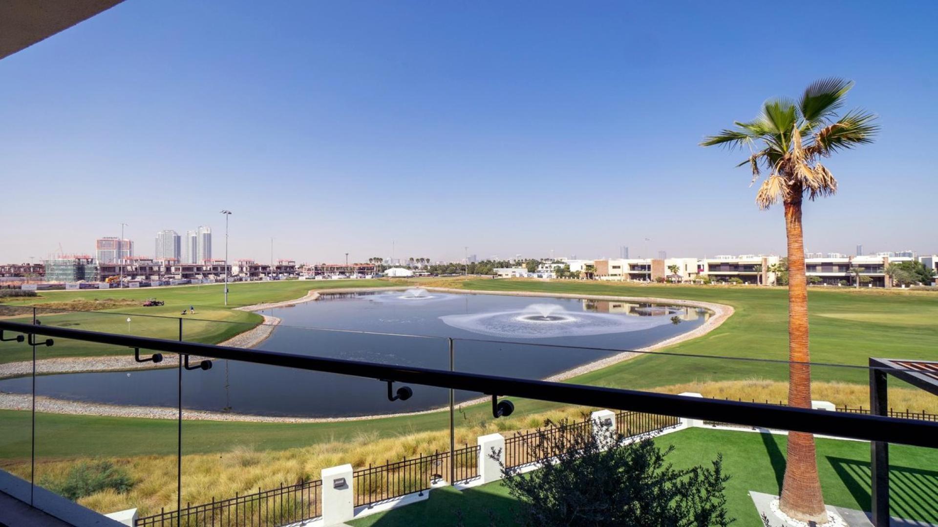 "Luxury villa with private pool and golf view in Damac Hills, Trevi community.",Upgraded villa with golf course view and private pool in Damac Hills, Trevi