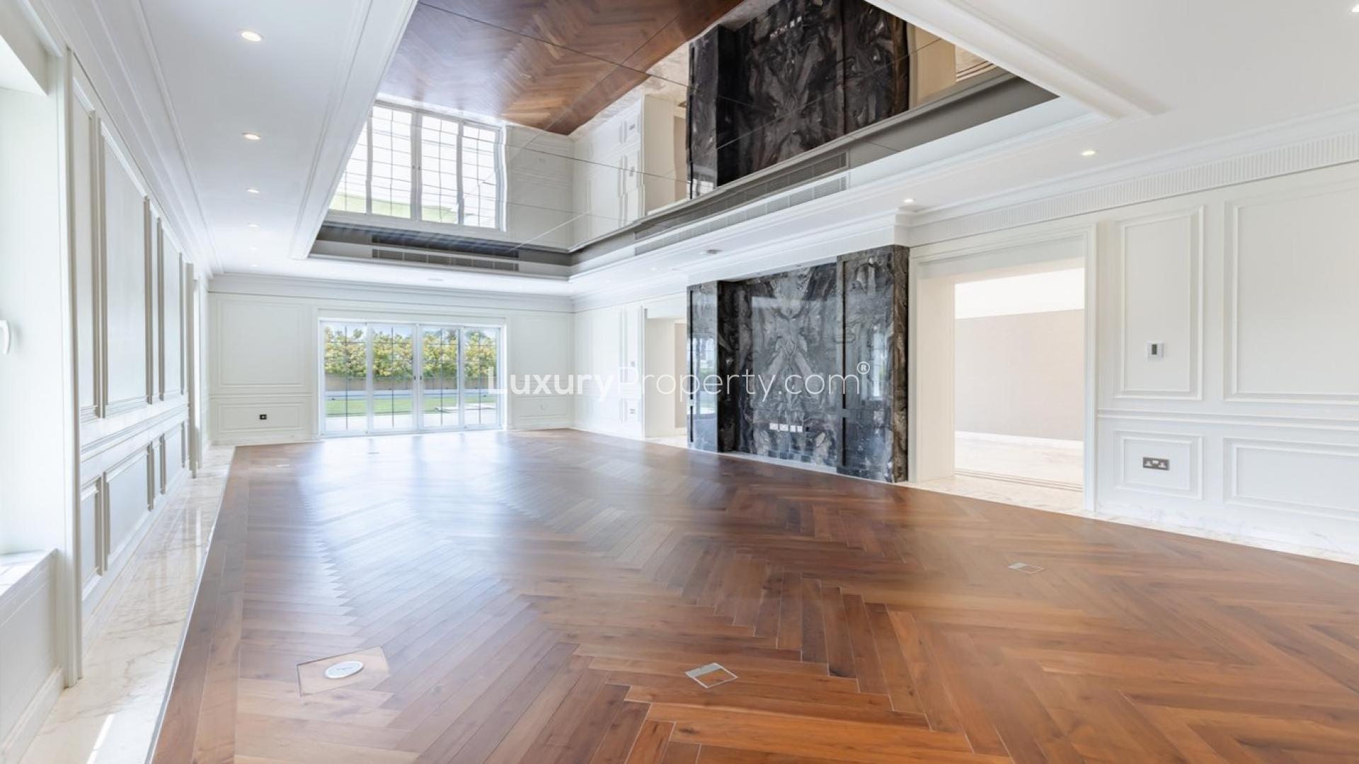 Luxurious 6-bedroom villa exterior with expansive lawn in Polo Homes, Arabian Ranches