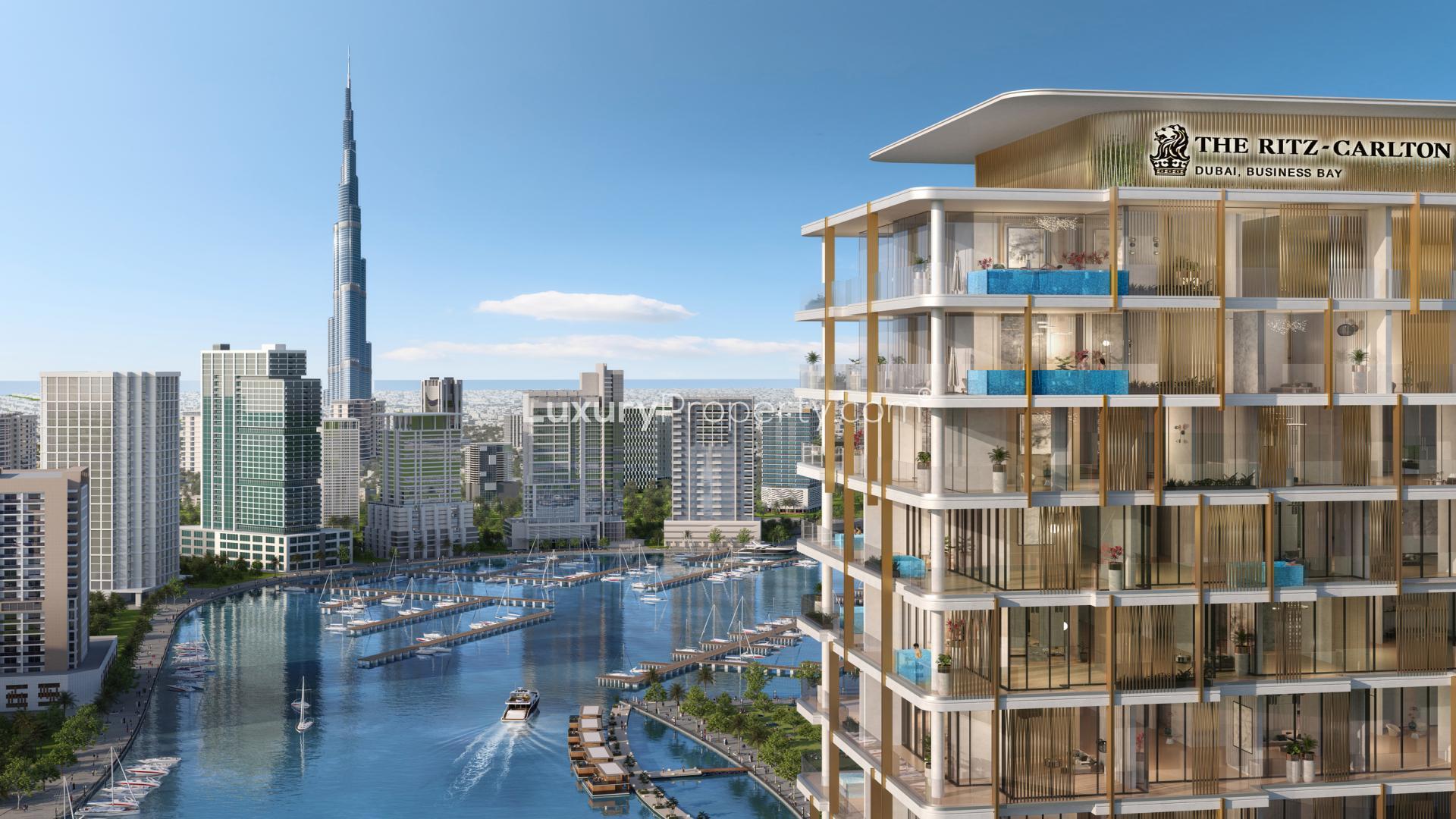 Luxurious Ritz-Carlton apartment terrace with pool, stunning city skyline view in Business Bay