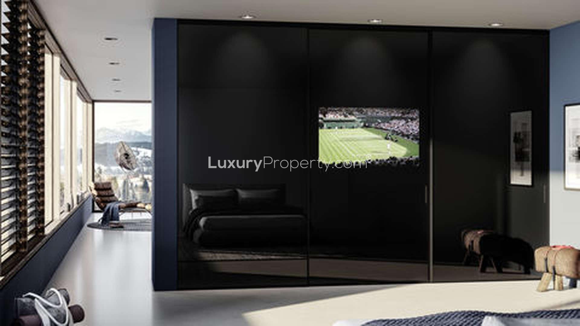 Luxurious living room with large windows in Ikoyi apartment for sale, Lagos