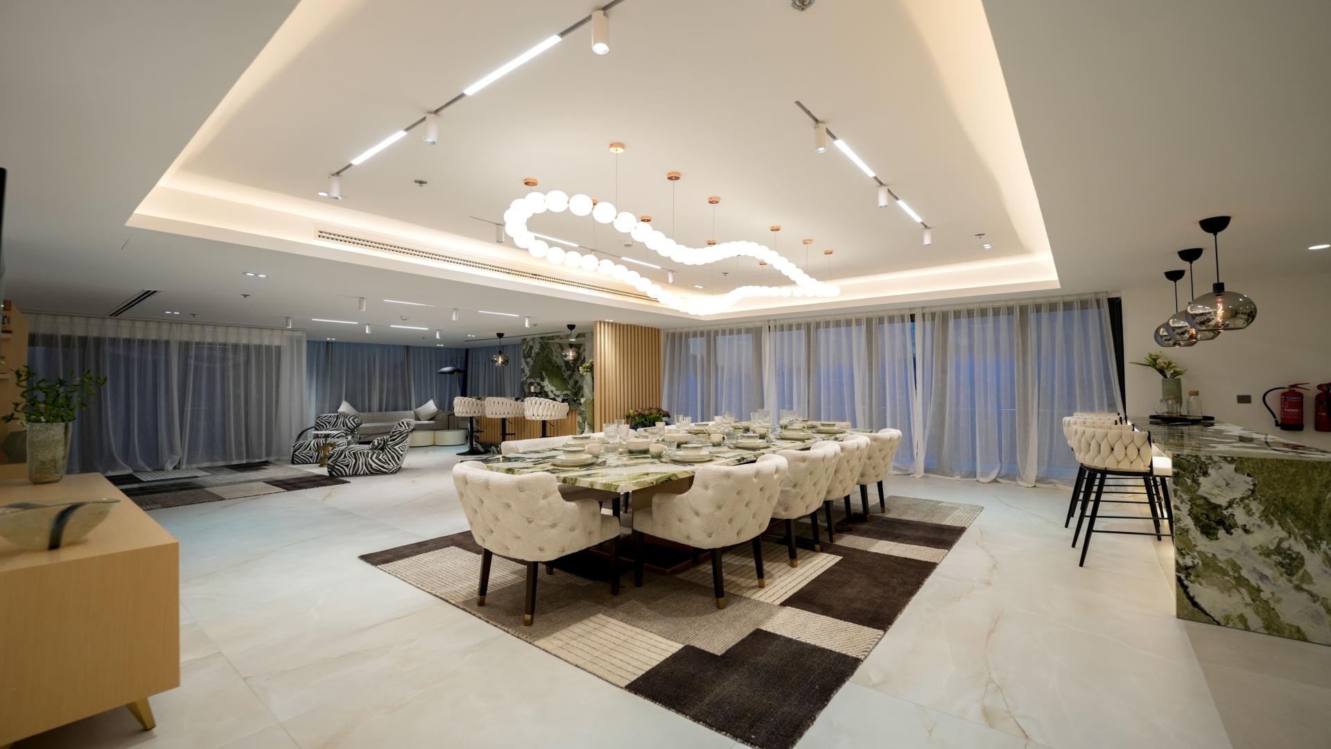 Luxurious living room in JLT penthouse with modern decor and elegant lighting