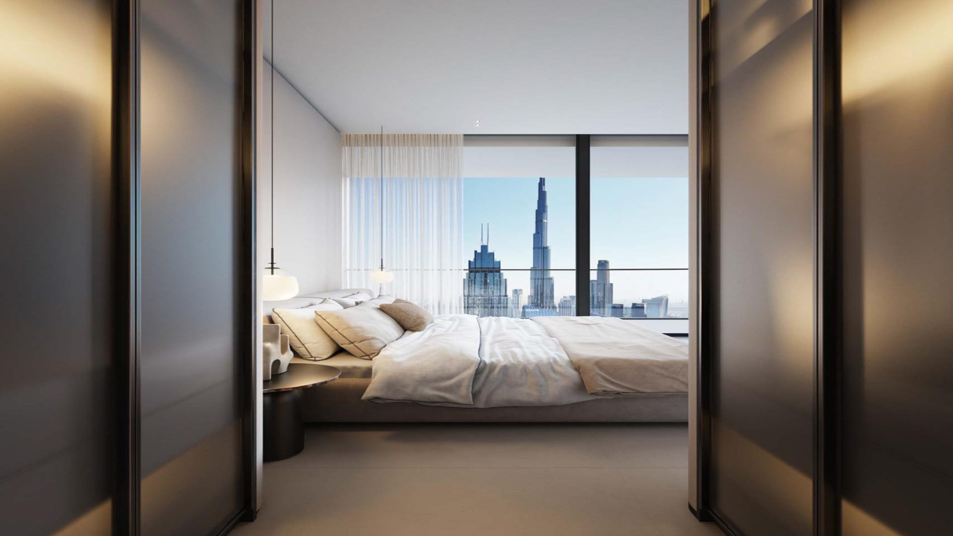 Luxurious penthouse living room with city skyline view at Akala Hotel, DIFC