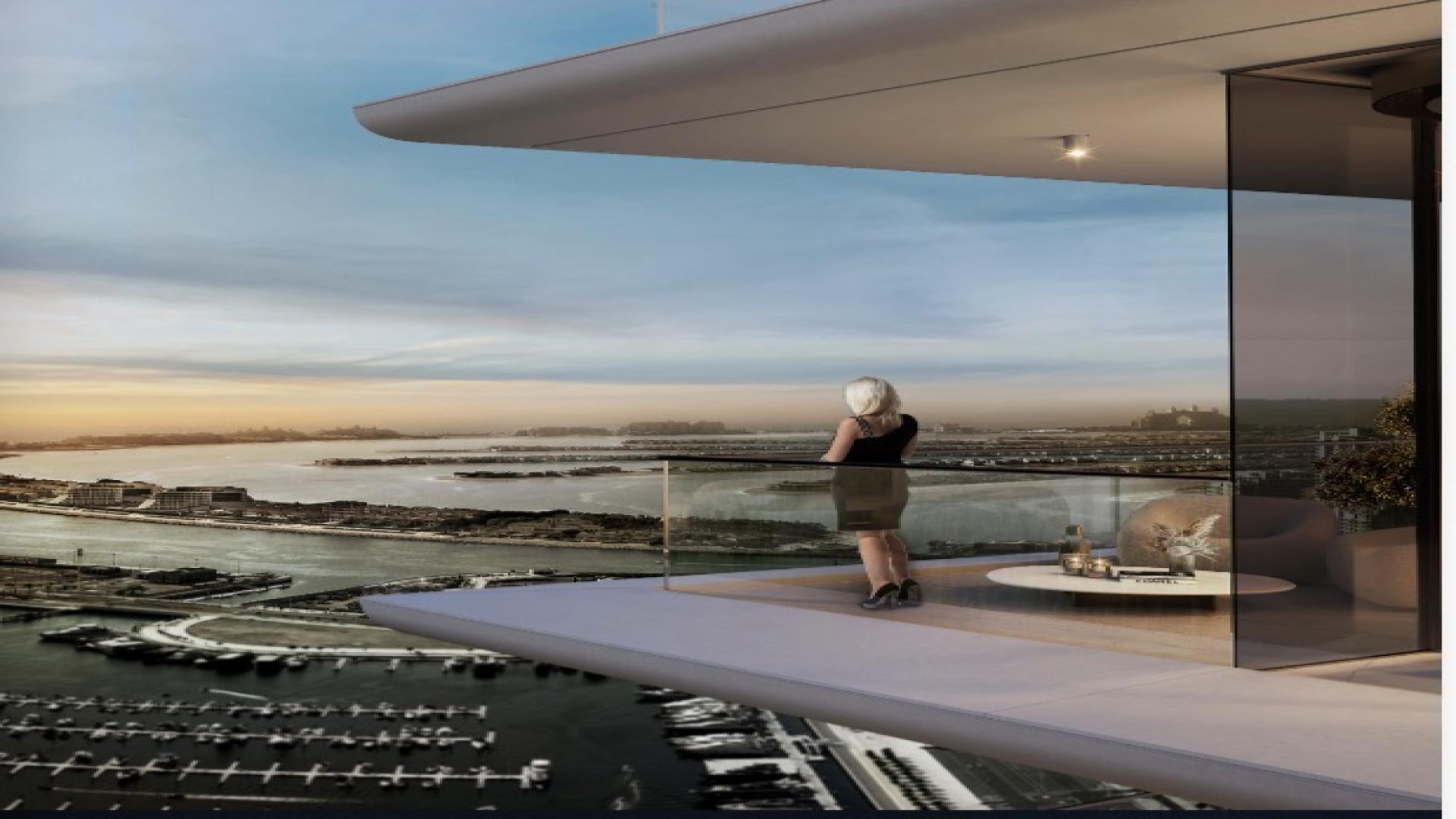 Luxurious penthouse terrace with infinity pool overlooking Dubai Marina skyline at sunset