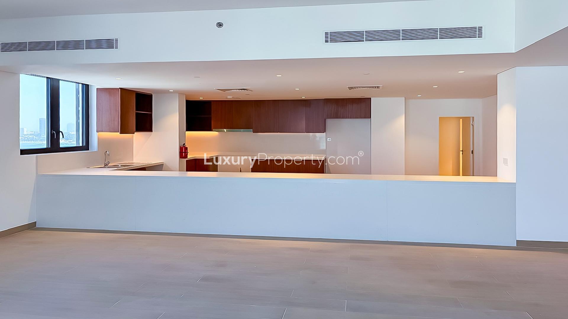 Balcony view from luxury penthouse at La Sirene, Jumeirah overlooking marina and buildings