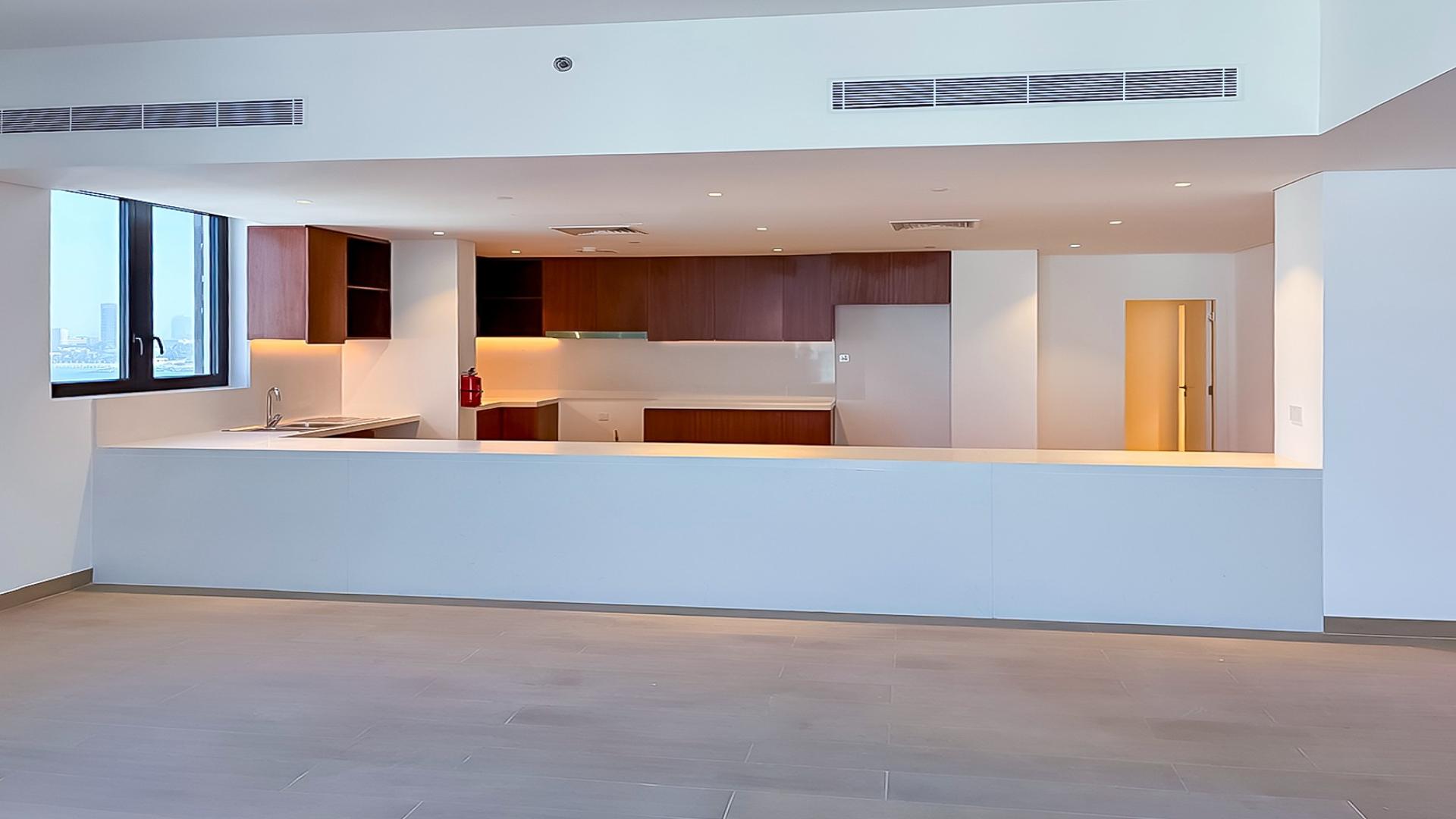 Balcony view from luxury penthouse at La Sirene, Jumeirah overlooking marina and buildings