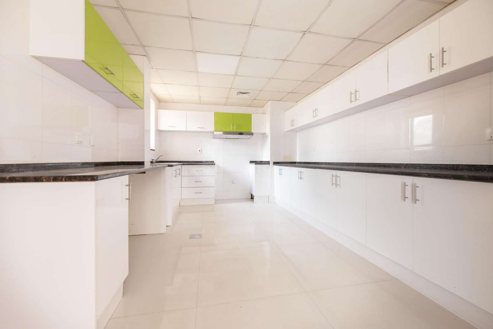 Spacious living room with large windows in Orchid Park townhouse, Jumeirah Village Circle