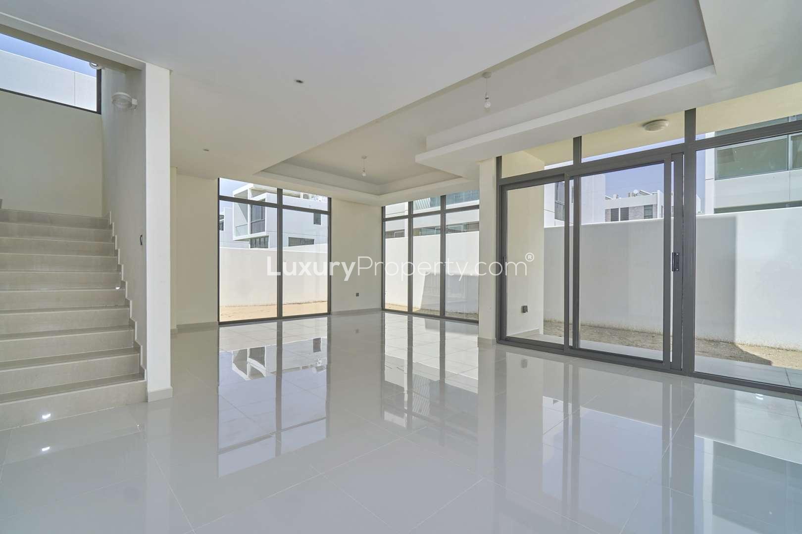 Modern 6-bedroom villa exterior with carport in Akoya Oxygen, Sycamore community