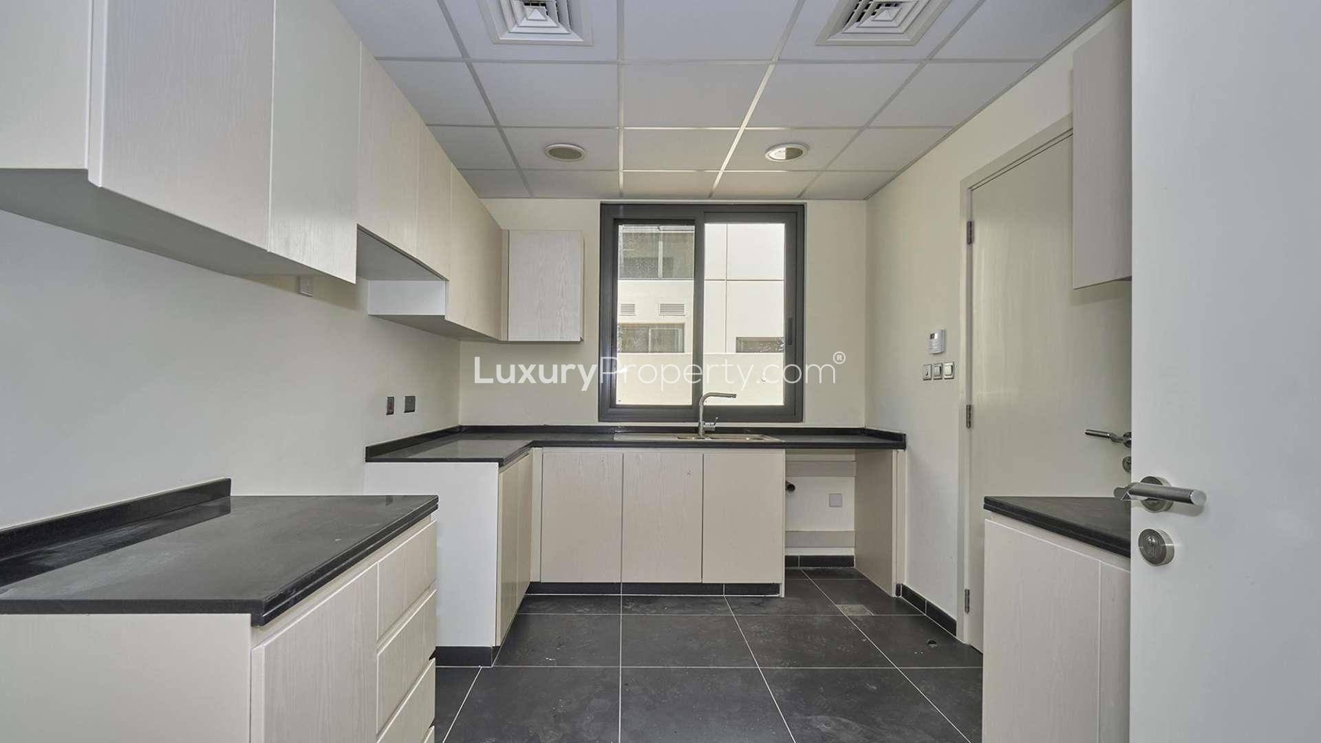 Spacious living area in vacant 6-bedroom villa, Claret, Damac Hills 2, for sale