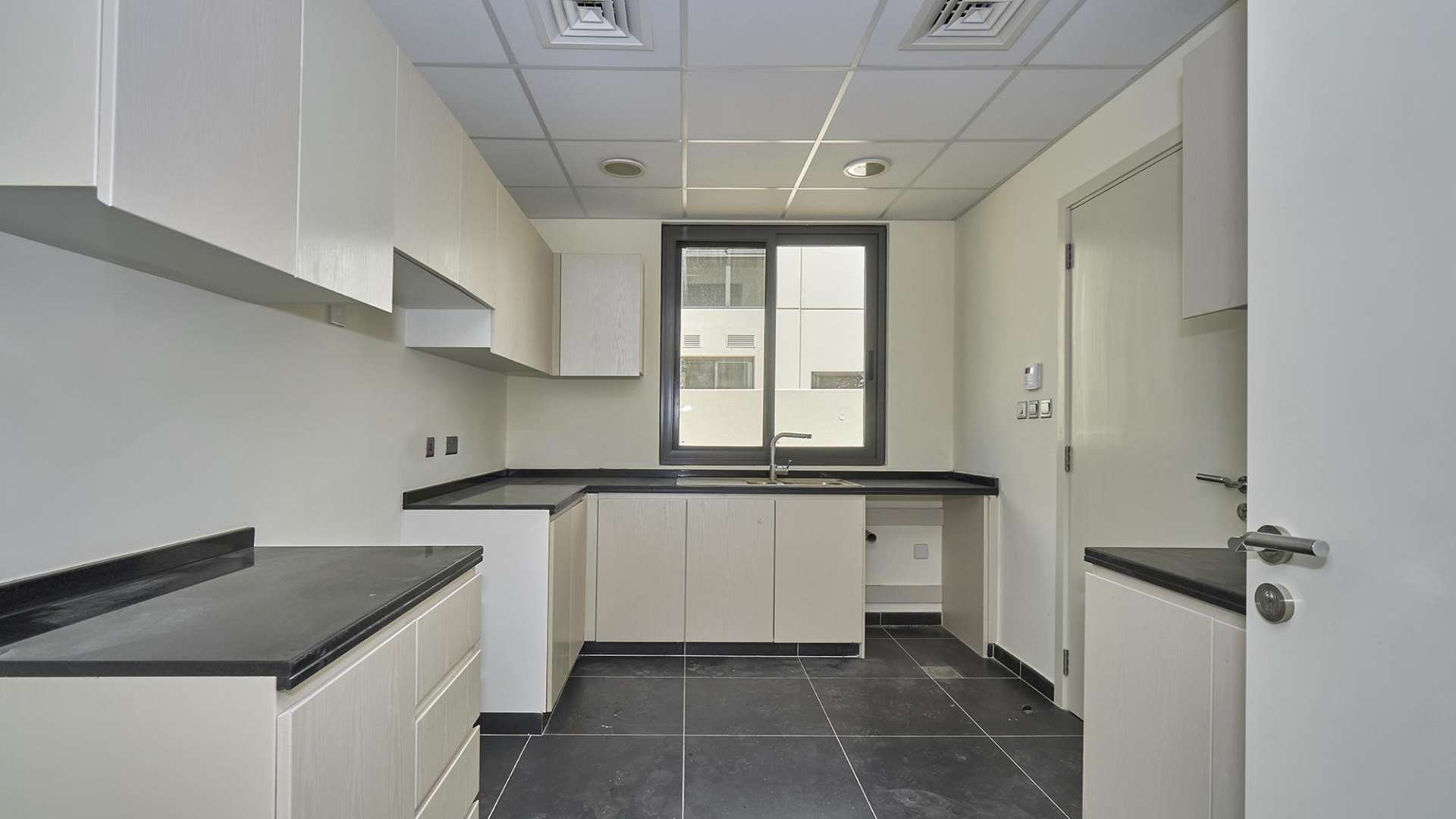 Spacious living area in vacant 6-bedroom villa, Claret, Damac Hills 2, for sale